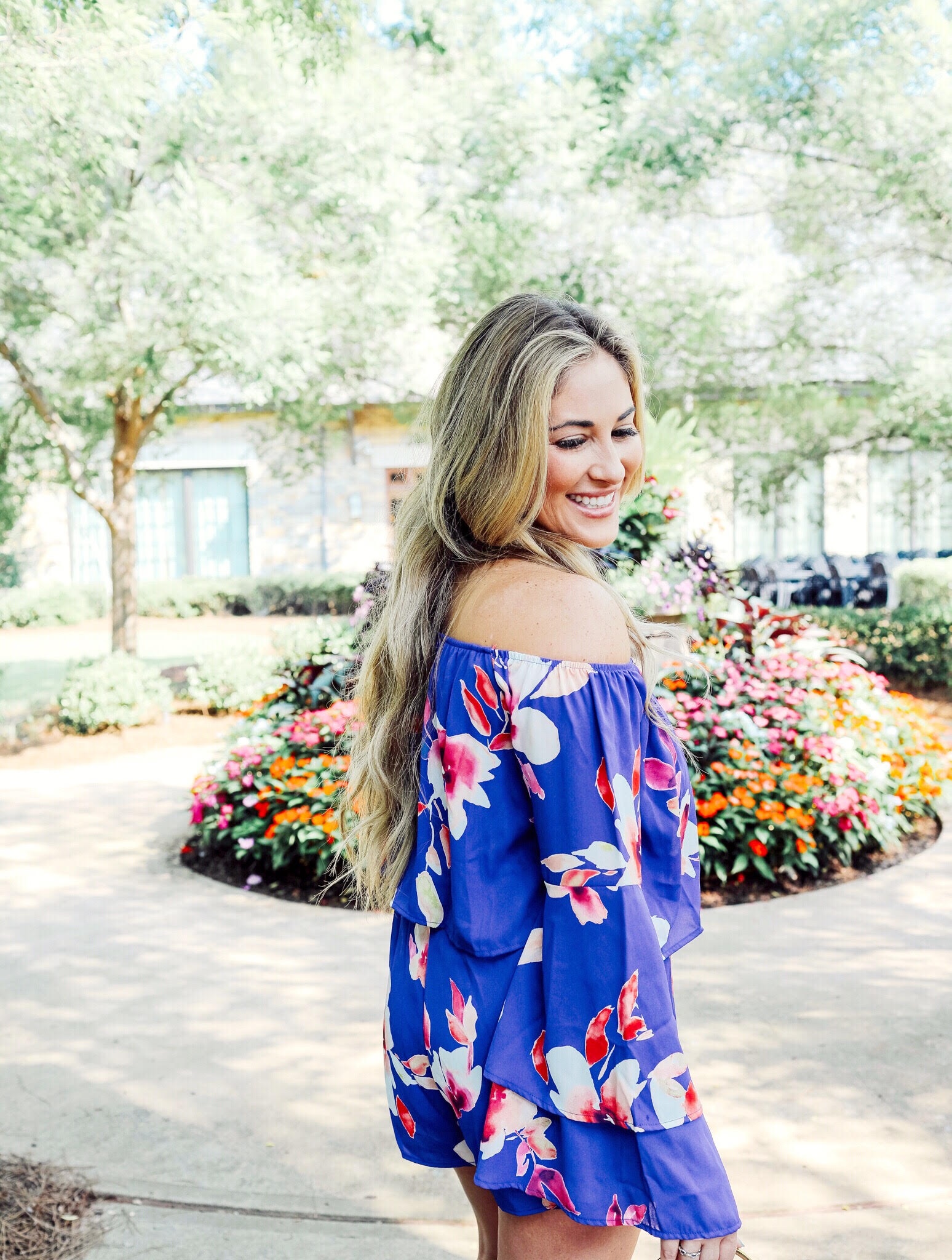 Super Cute Off the Shoulder Floral Romper from the Pink Lily Boutique featured by popular fashion blogger, Walking in Memphis in High Heels