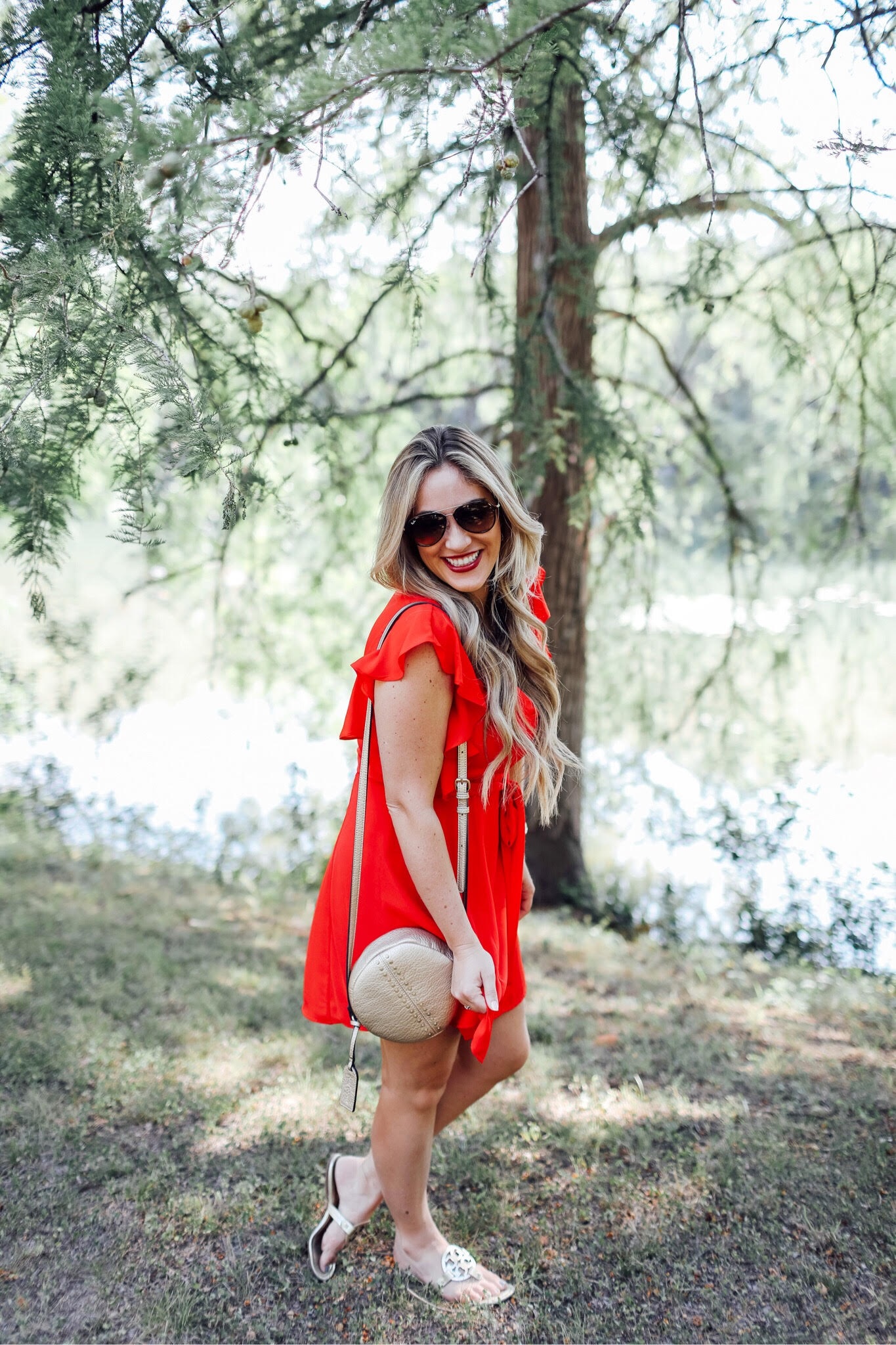 Cute summer dresses featured by popular fashion blogger, Walking in Memphis in High Heels: Socialite red ruffle sleeve dress