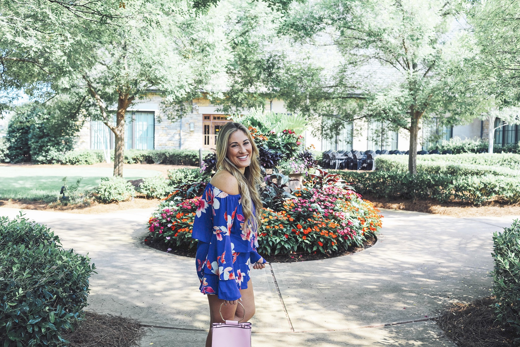 Super Cute Off the Shoulder Floral Romper from the Pink Lily Boutique featured by popular fashion blogger, Walking in Memphis in High Heels