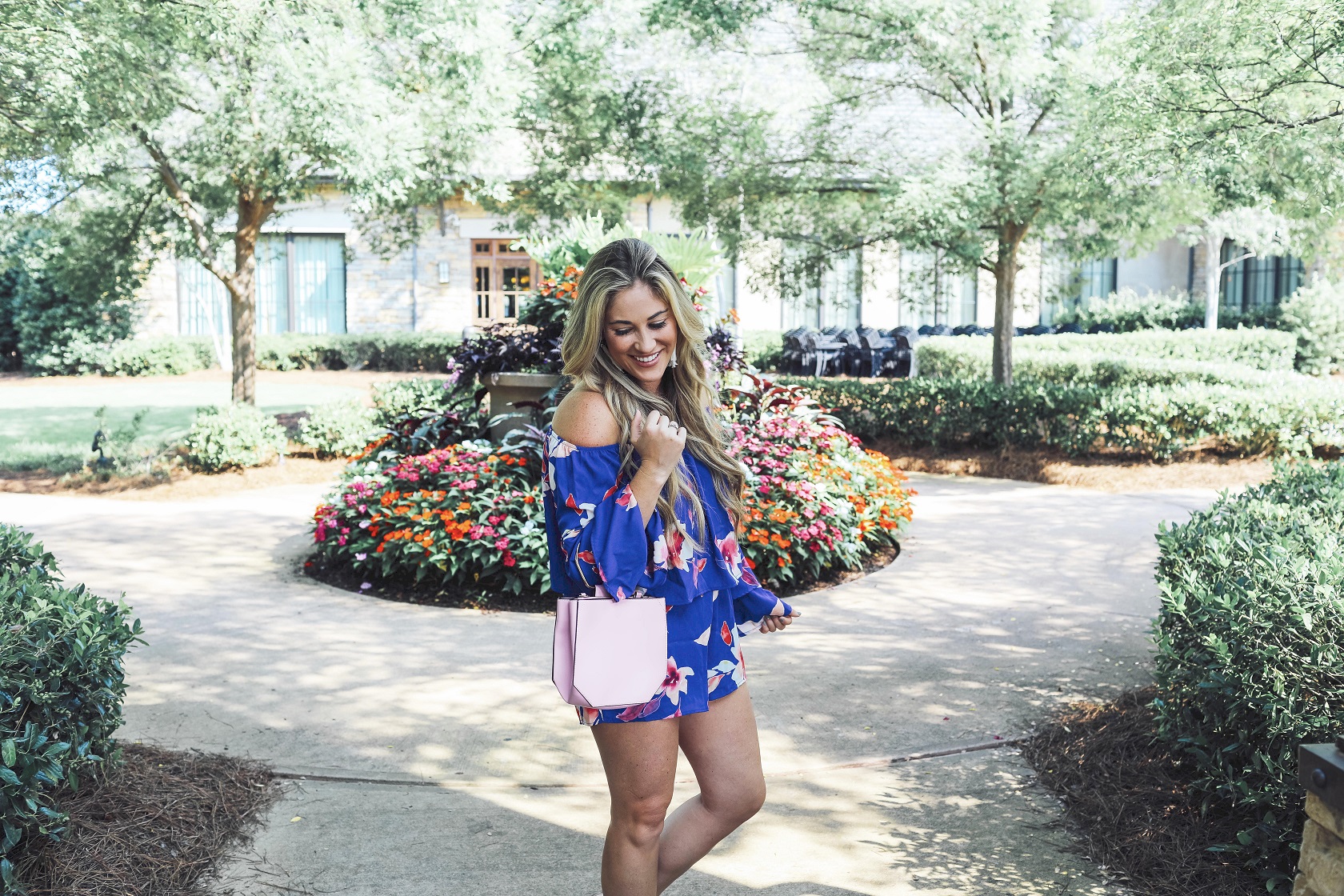 Super Cute Off the Shoulder Floral Romper from the Pink Lily Boutique featured by popular fashion blogger, Walking in Memphis in High Heels