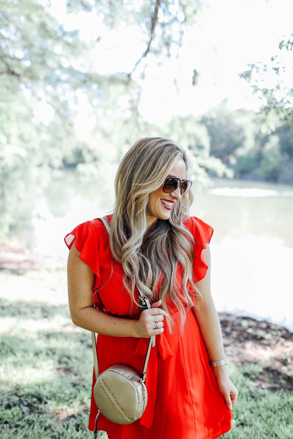 Cute summer dresses featured by popular fashion blogger, Walking in Memphis in High Heels: Socialite red ruffle sleeve dress