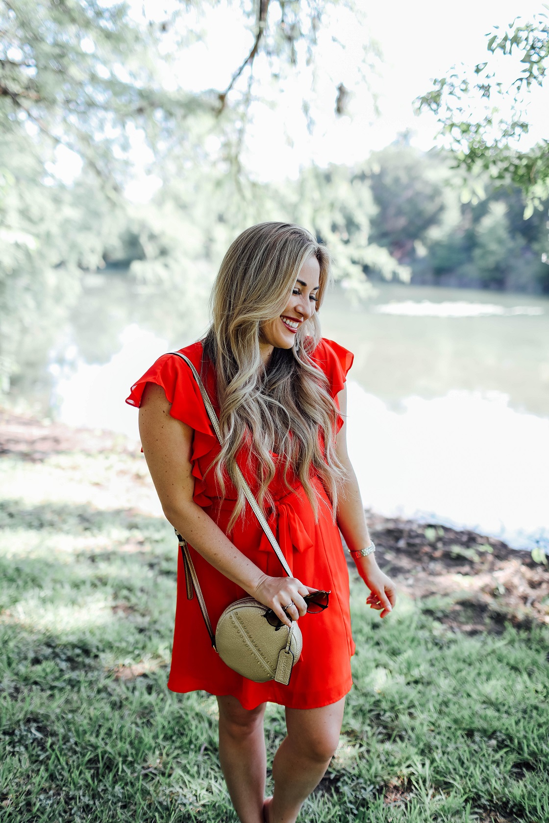 Cute summer dresses featured by popular fashion blogger, Walking in Memphis in High Heels: Socialite red ruffle sleeve dress