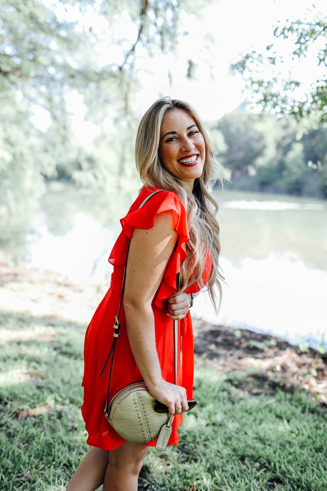 Cute summer dresses featured by popular fashion blogger, Walking in Memphis in High Heels: Socialite red ruffle sleeve dress