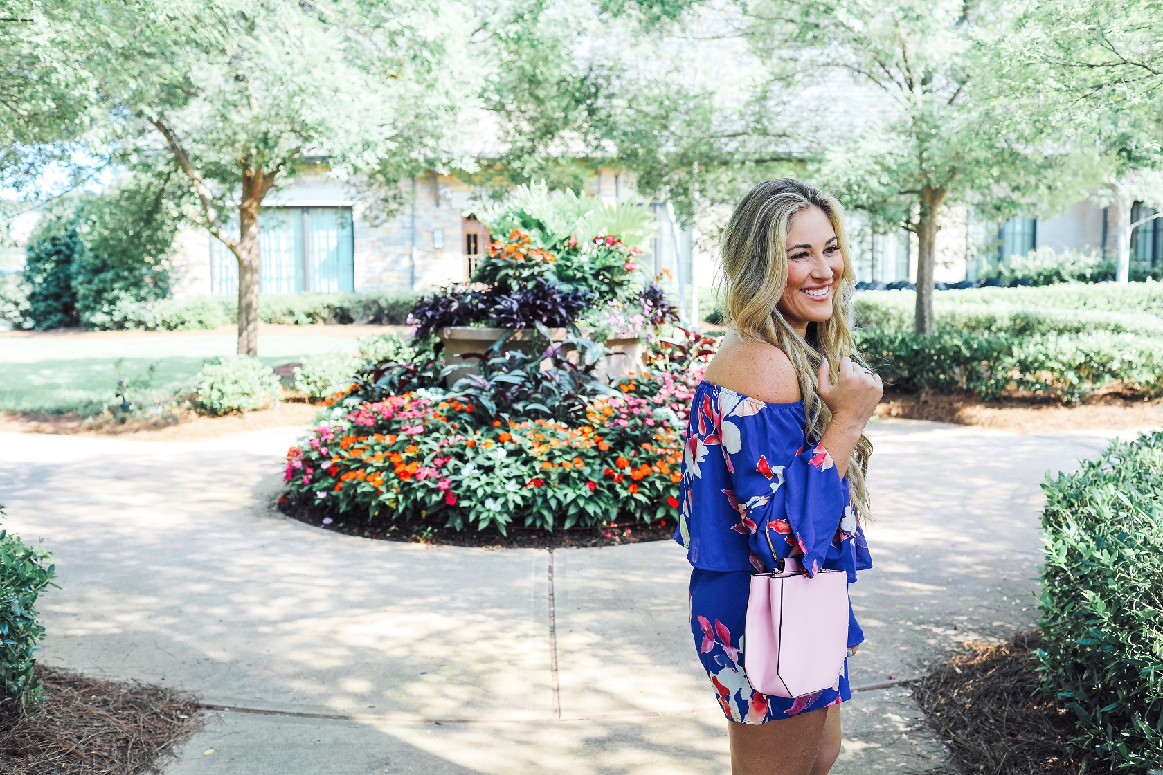 Super Cute Off the Shoulder Floral Romper from the Pink Lily Boutique featured by popular fashion blogger, Walking in Memphis in High Heels