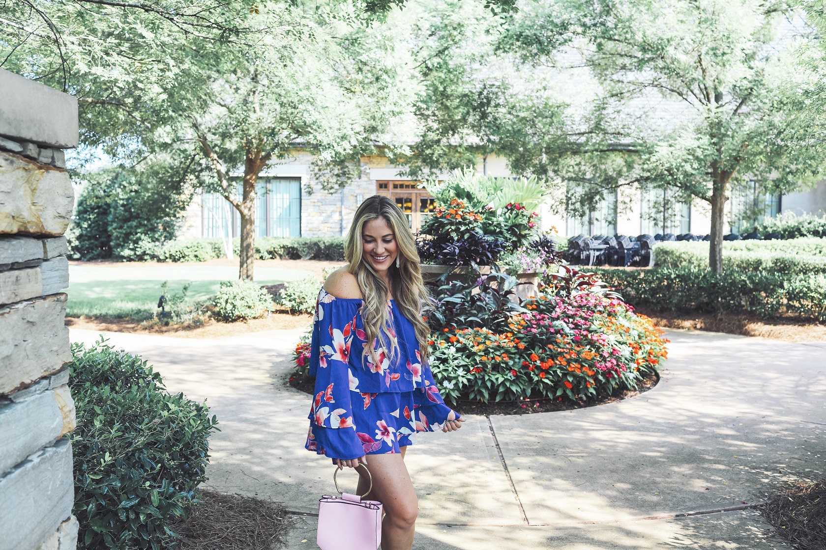 Super Cute Off the Shoulder Floral Romper from the Pink Lily Boutique featured by popular fashion blogger, Walking in Memphis in High Heels