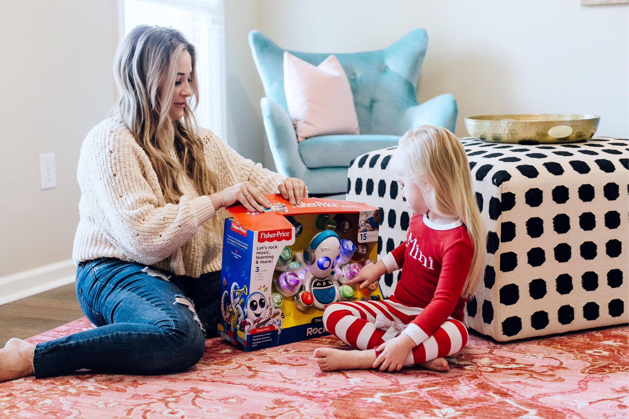 Top 10 Best Toys for Toddlers to Buy this Christmas featured by top US lifestyle blog, Walking in Memphis in High Heels: image of a mom and daughter duo playing with holiday toys