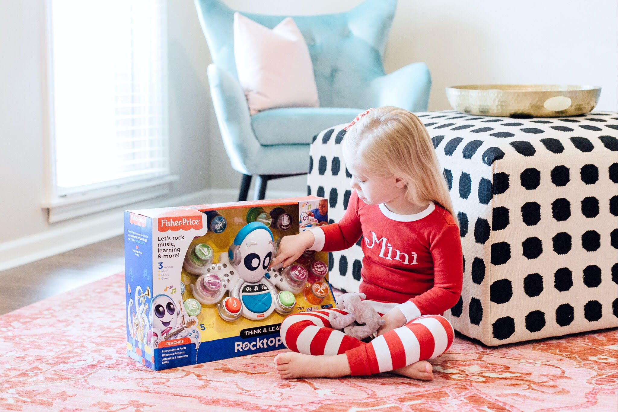 Top 10 Best Toys for Toddlers to Buy this Christmas featured by top US lifestyle blog, Walking in Memphis in High Heels: image of a mom and daughter duo playing with holiday toys
