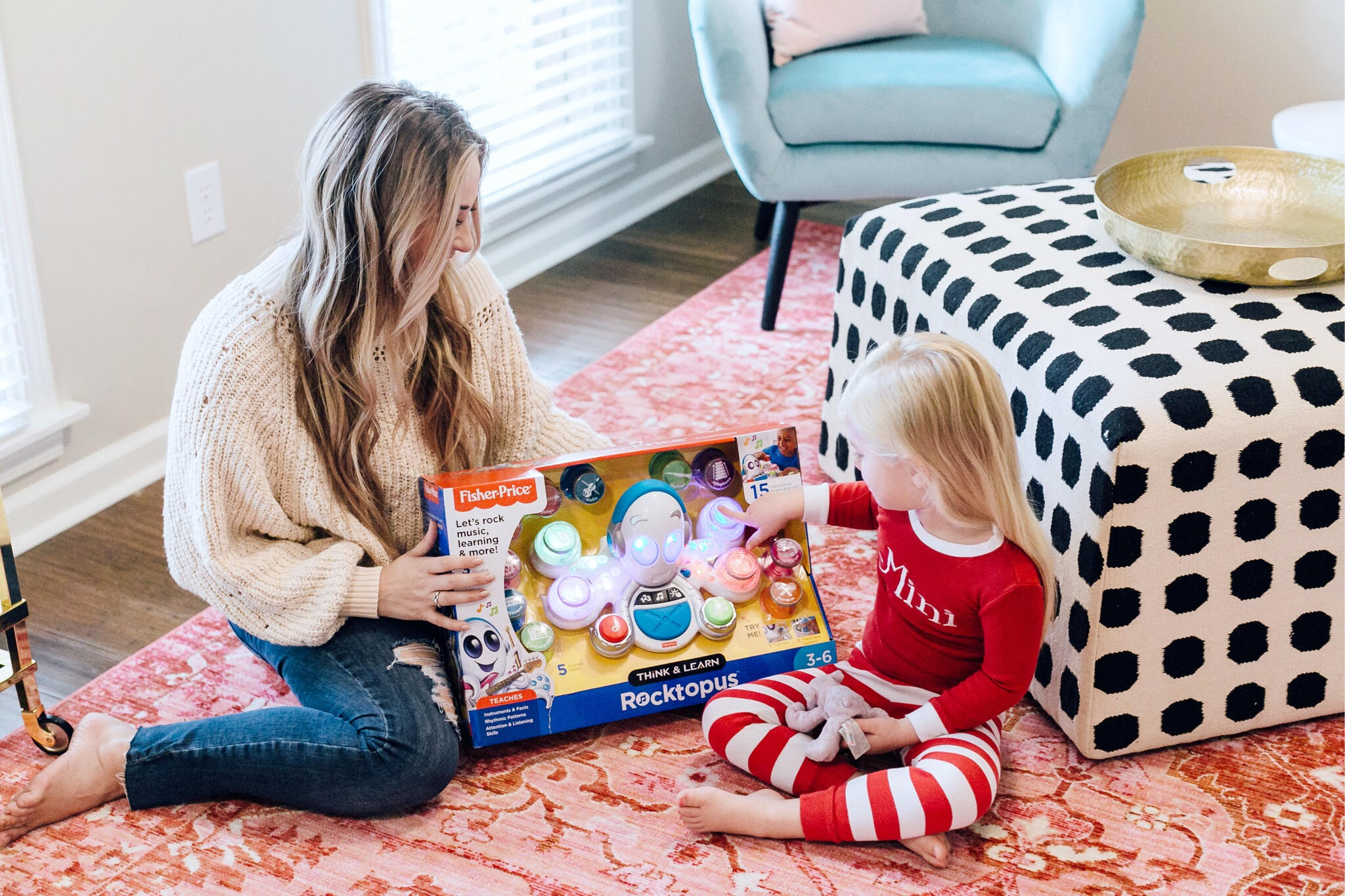 Top 10 Best Toys for Toddlers to Buy this Christmas featured by top US lifestyle blog, Walking in Memphis in High Heels: image of a mom and daughter duo playing with holiday toys