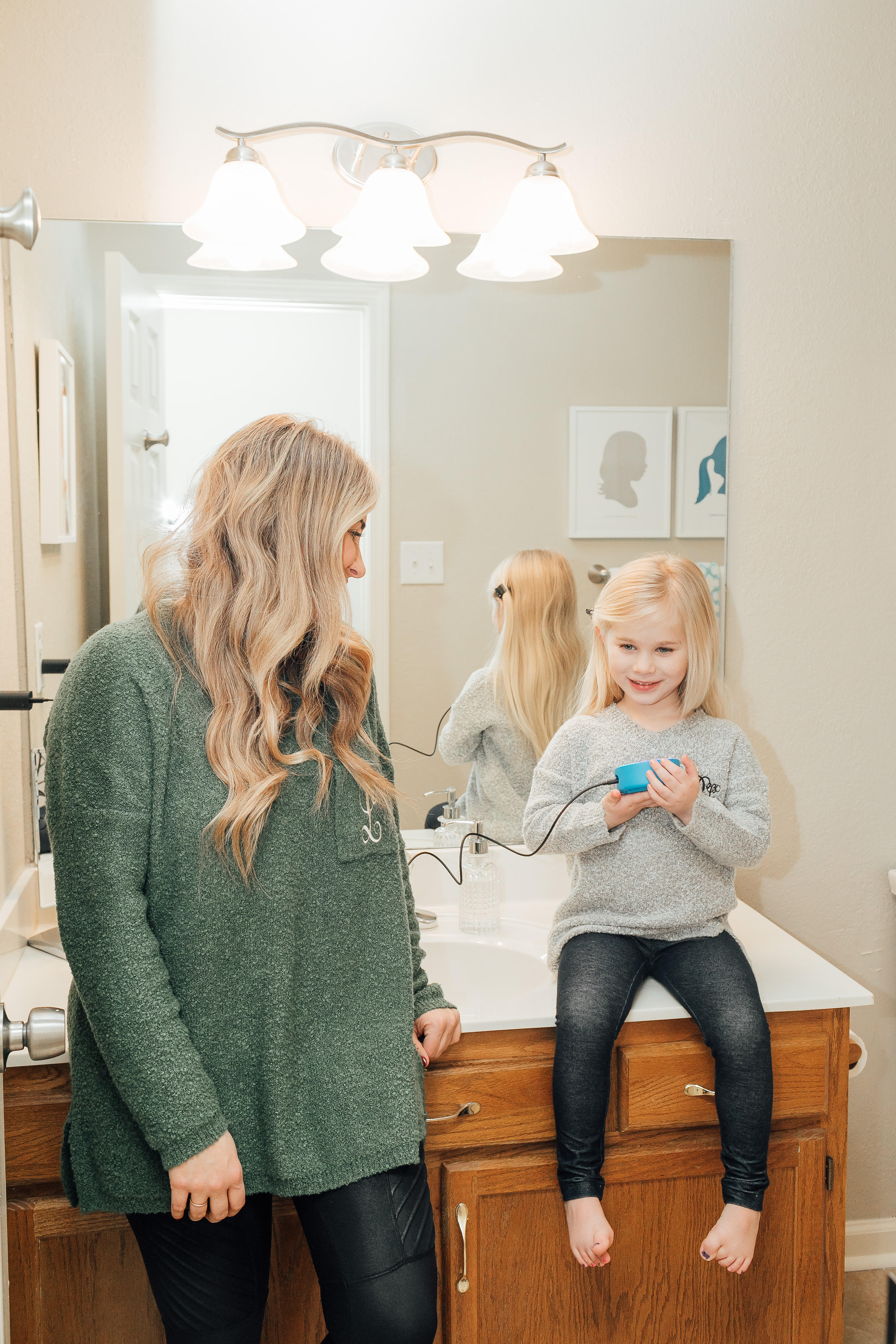 How to Use Amazon Alexa featured by top US lifestyle blog Walking in Memphis in High Heels; Image of a mother with her daughter smiling.