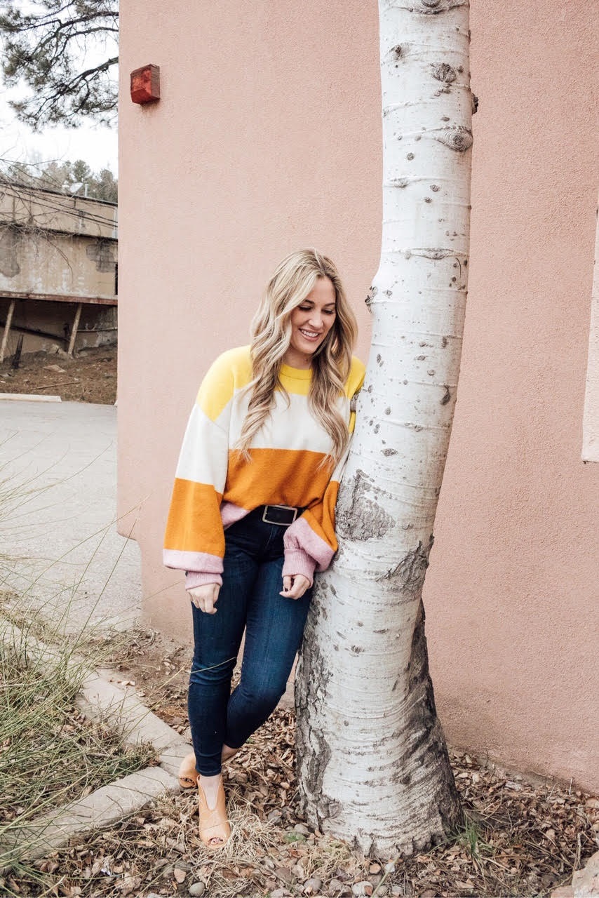 Madewell Sweater to take you from Winter to Spring styled by top US fashion blog, Walking in Memphis in High Heels: image of a woman wearing a colorblock Madewell sweater, KUT ankle skinny jeans and Vince Camuto shooties