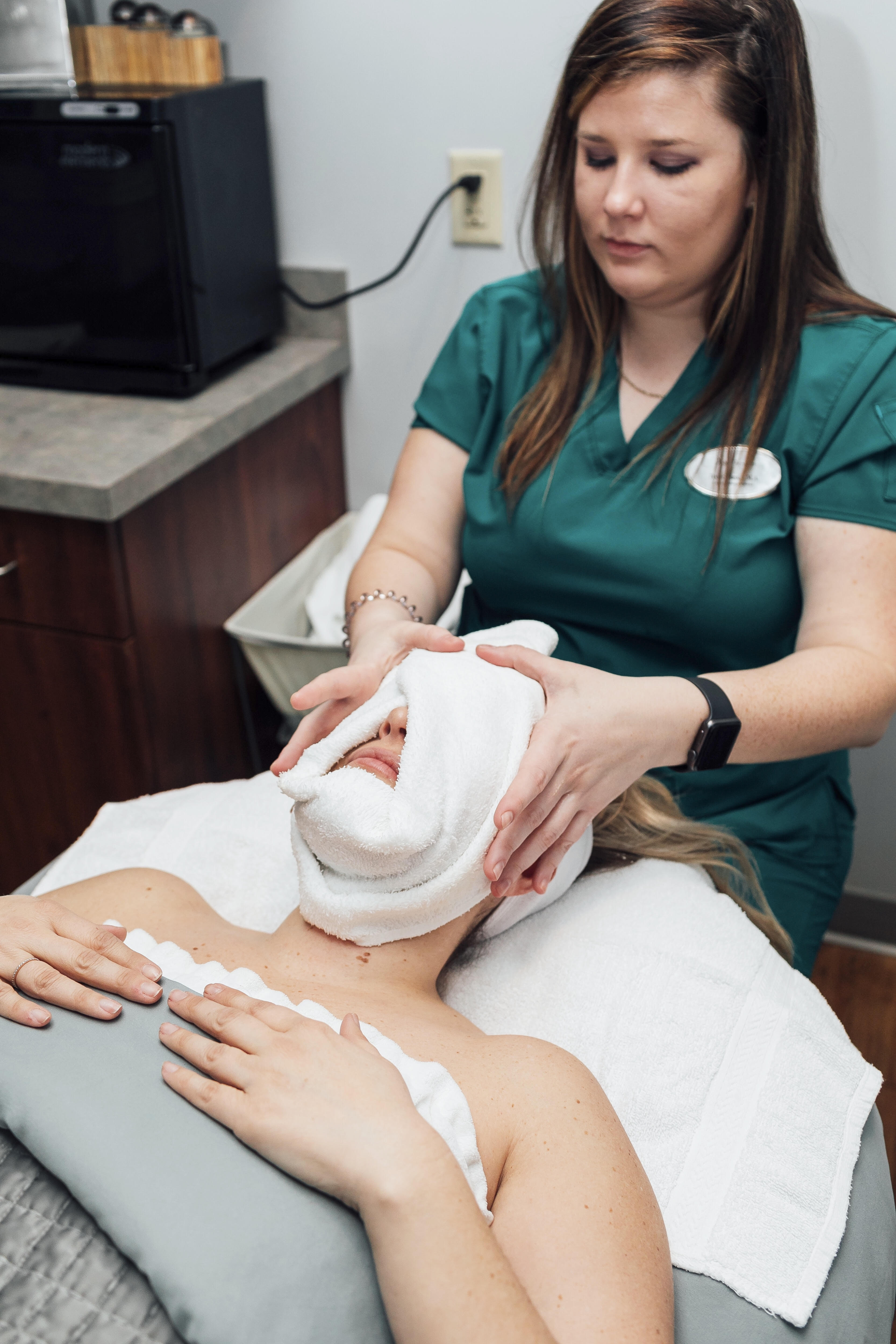How Often Should You Get a Facial? featured by top US beauty blog, Walking in Memphis in High Heels: image of a woman getting a facial at Spa Therapies