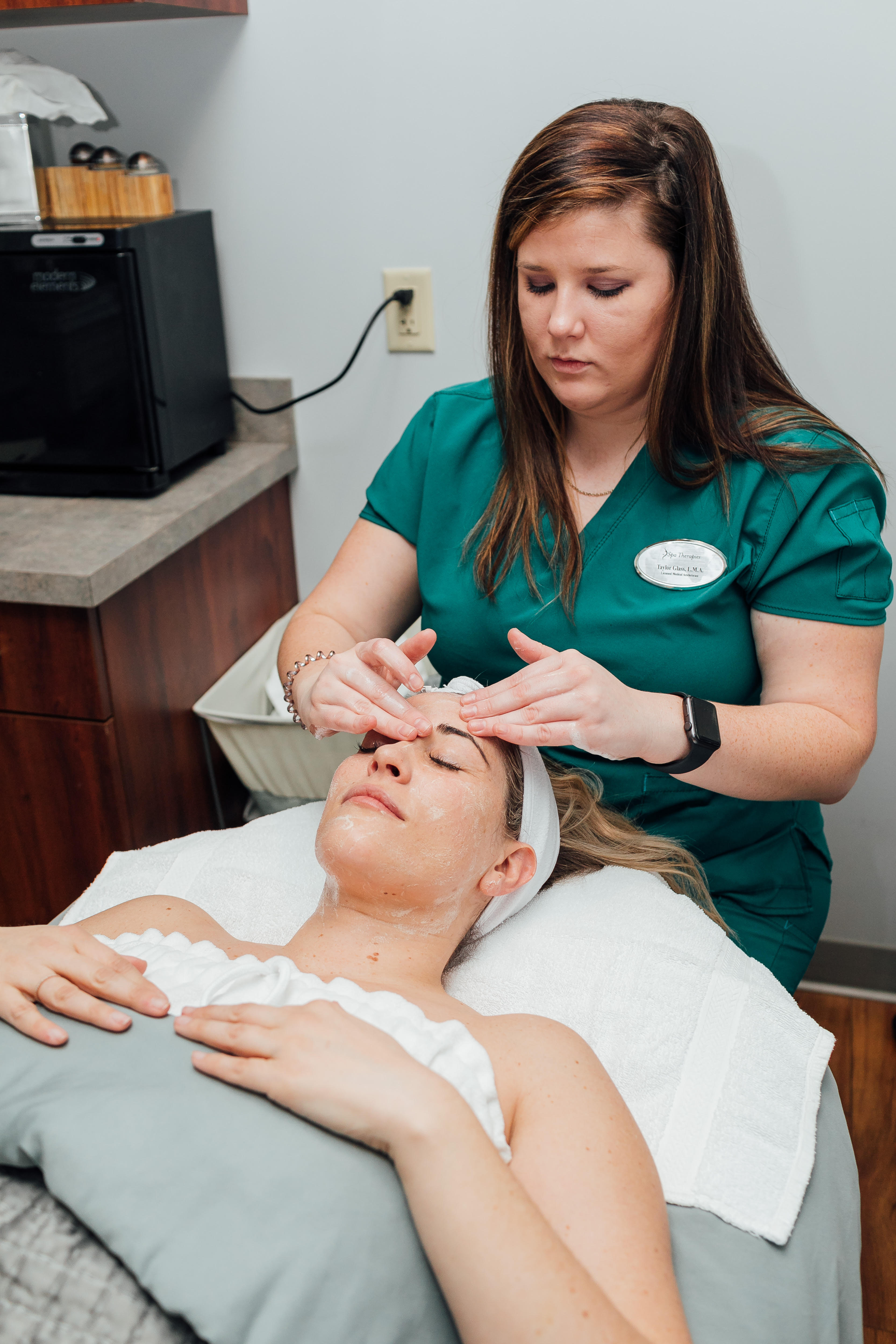 How Often Should You Get a Facial? featured by top US beauty blog, Walking in Memphis in High Heels: image of a woman getting a facial at Spa Therapies