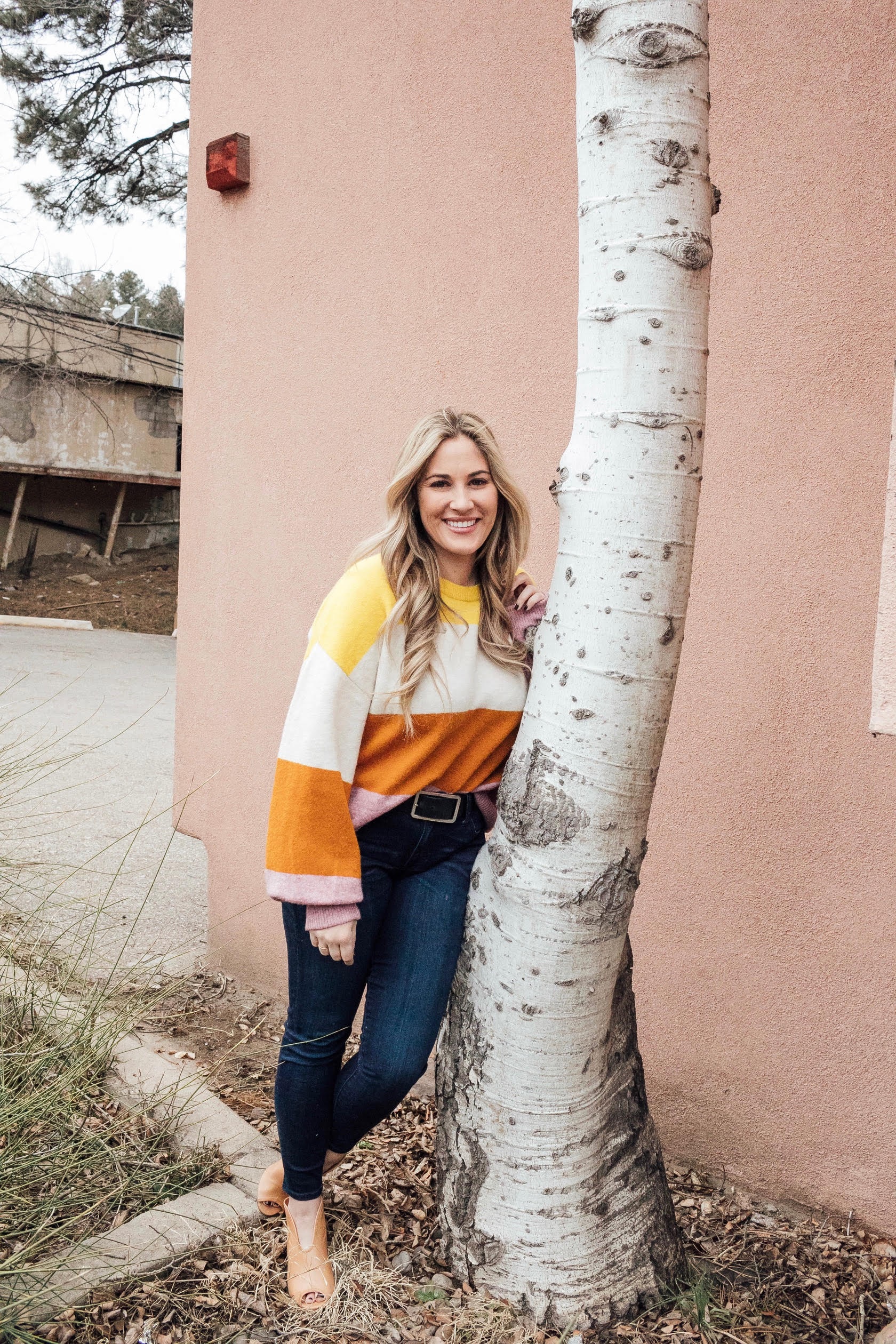 Madewell Sweater to take you from Winter to Spring styled by top US fashion blog, Walking in Memphis in High Heels: image of a woman wearing a colorblock Madewell sweater, KUT ankle skinny jeans and Vince Camuto shooties