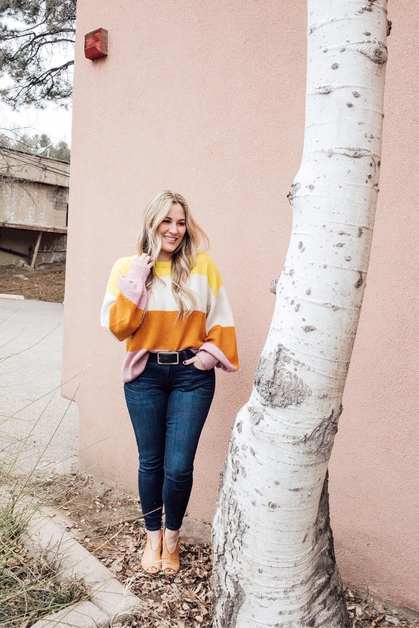 Madewell Sweater to take you from Winter to Spring styled by top US fashion blog, Walking in Memphis in High Heels: image of a woman wearing a colorblock Madewell sweater, KUT ankle skinny jeans and Vince Camuto shooties