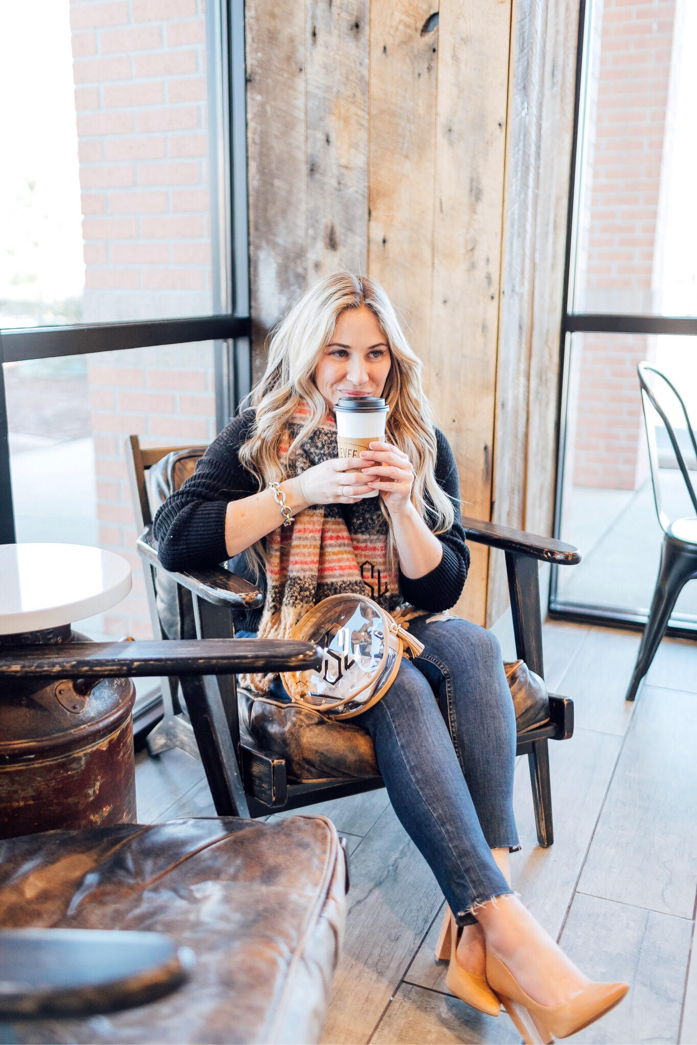 Monogrammed clear circle bag featured by top US fashion blog, Waling in Memphis in High Heels: image of a woman wearing an LLBean tunic sweater, Free People skinny jeans, Banana Republic pumps, Marley Lilly clear circle bag, and MarleyLilly monogrammed scarf