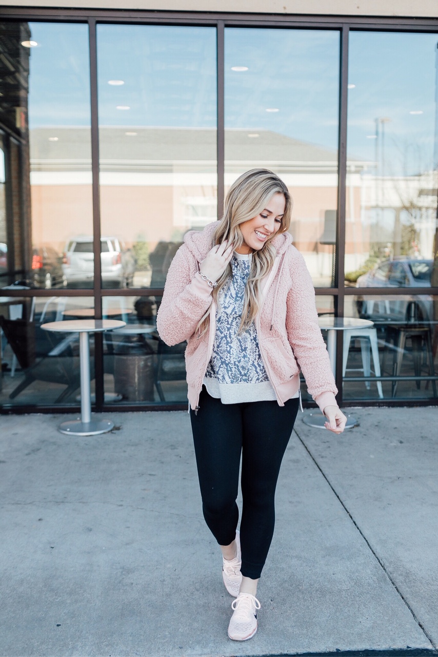 Core Challenge featured by top fitness blog, Walking in Memphis in High Heels: image of a woman wearing a Marc New York Performance fleece jacket, Snake Skin cotton sweatshirt, scalloped leggings and Nike Flyknit sneakers