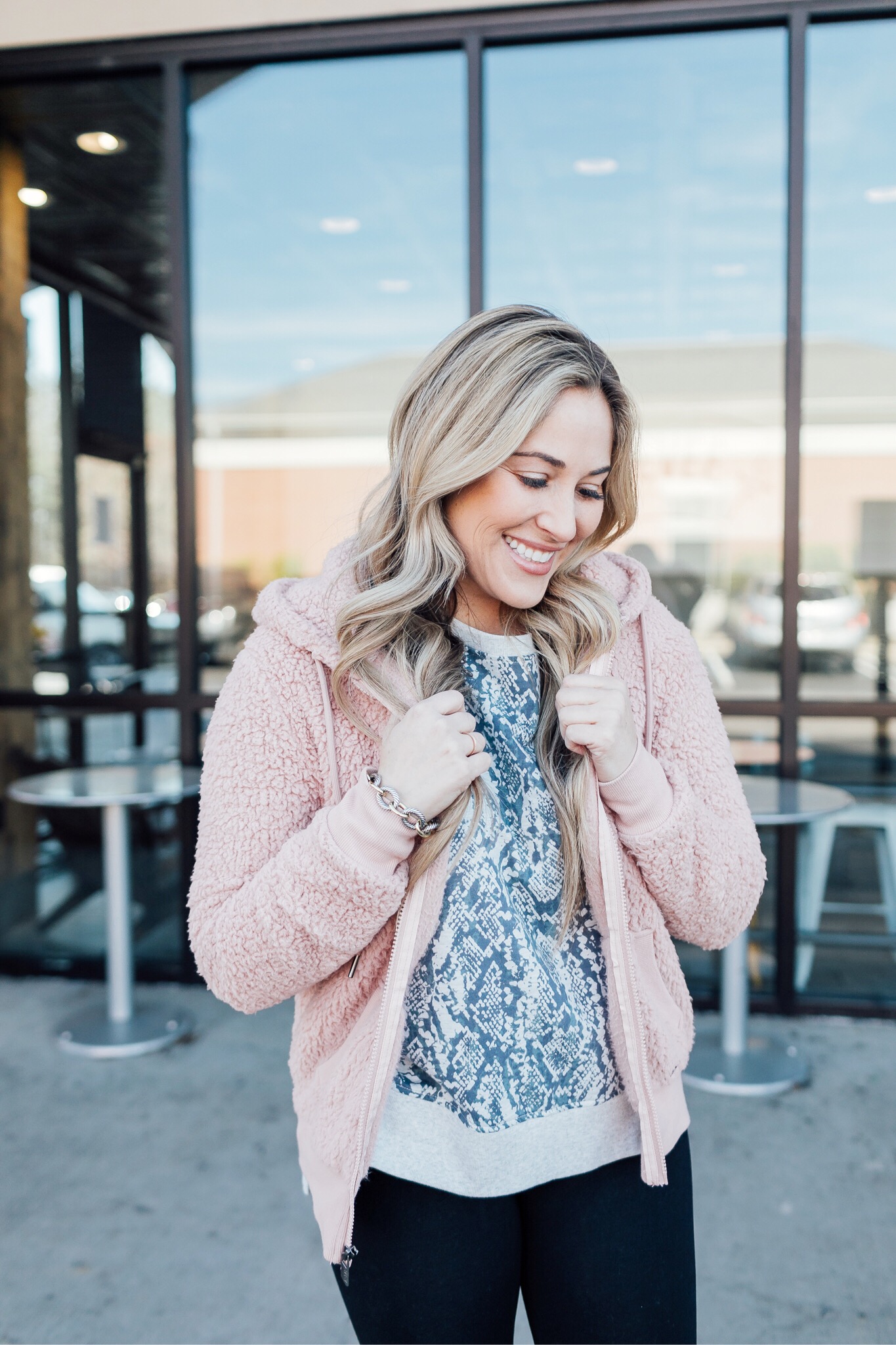 Core Challenge featured by top fitness blog, Walking in Memphis in High Heels: image of a woman wearing a Marc New York Performance fleece jacket, Snake Skin cotton sweatshirt, scalloped leggings and Nike Flyknit sneakers