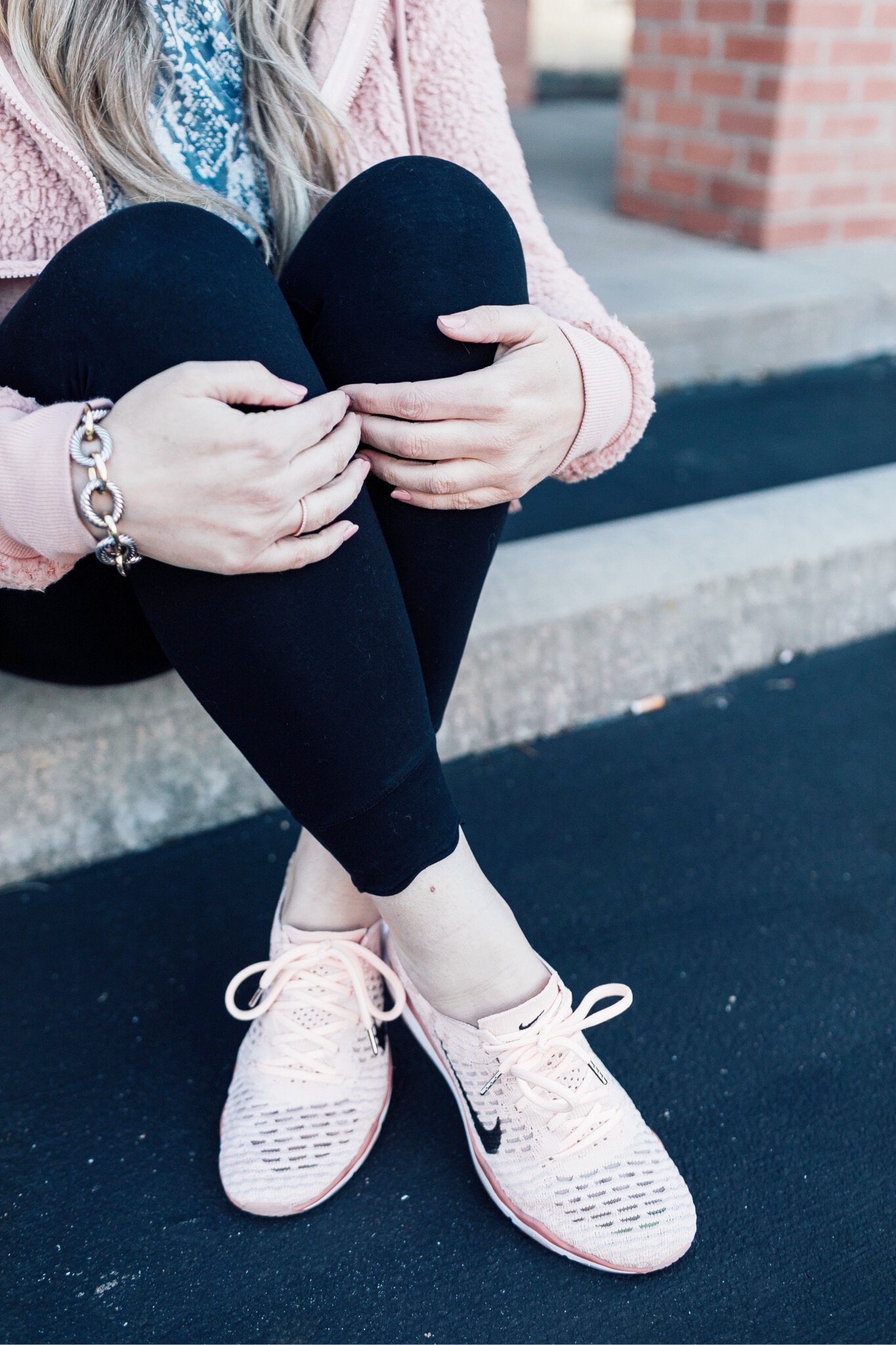 Core Challenge featured by top fitness blog, Walking in Memphis in High Heels: image of a woman wearing a Marc New York Performance fleece jacket, Snake Skin cotton sweatshirt, scalloped leggings and Nike Flyknit sneakers