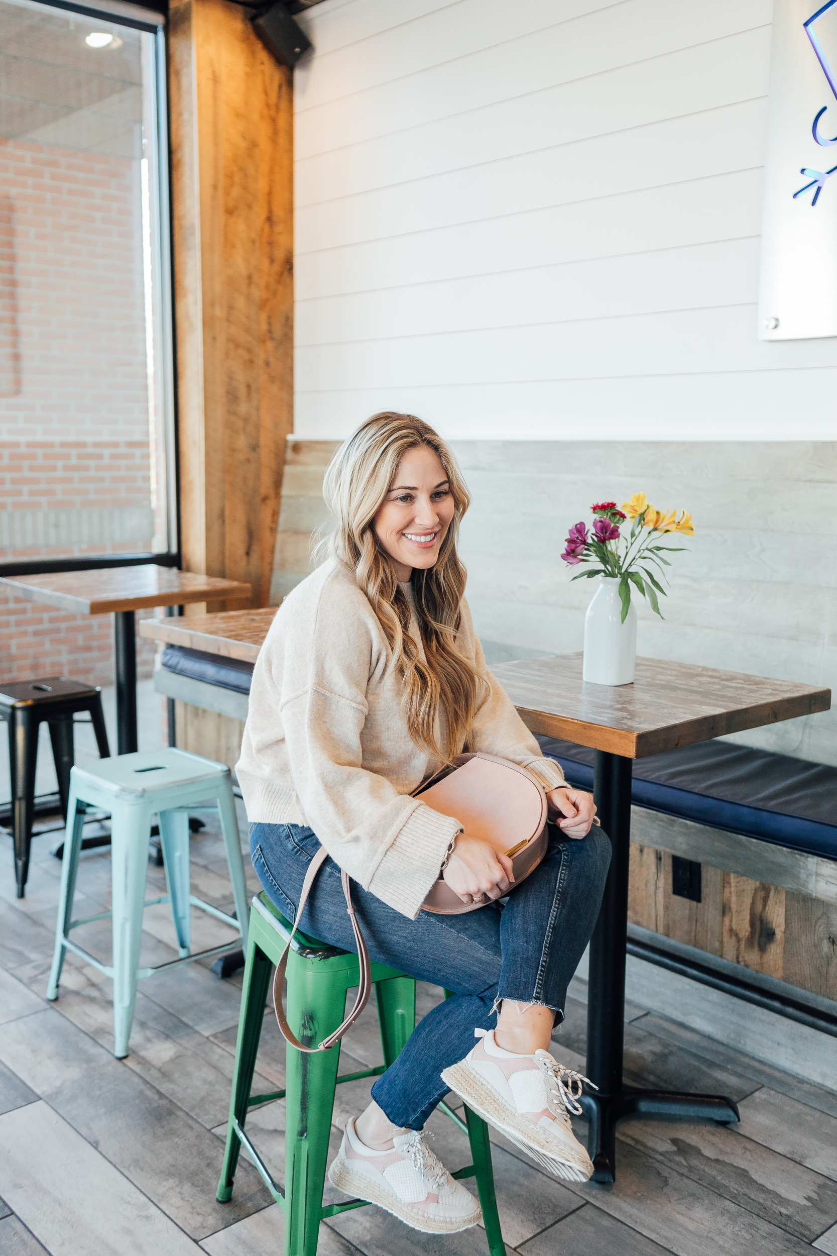 Cute spring footwear featured by top US fashion blog, Walking in Memphis in High Heels: image of a woman wearing March Fisher, TOPSHOP popper sweater, Free People skinny jeans and CUYANA saddle bag