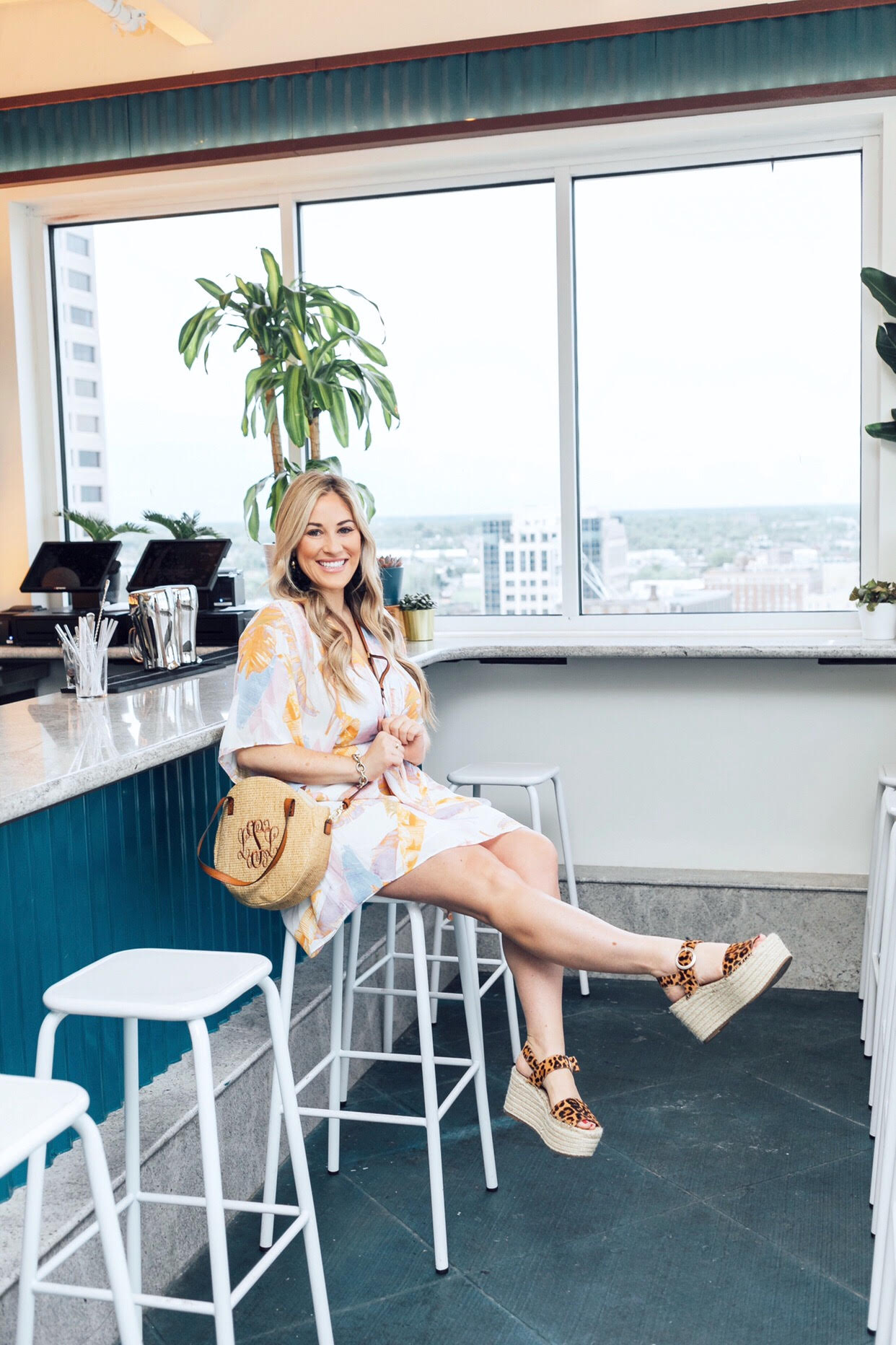 Cute palm print dress styled for Summer by top US fashion blog, Walking in Memphis in High Heels: image of a woman wearing a Buddy Love Multicolor Palm Print Dress, Marc Fisher leopard espadrille sandals and MarleyLilly monogrammed straw crossbody bag.