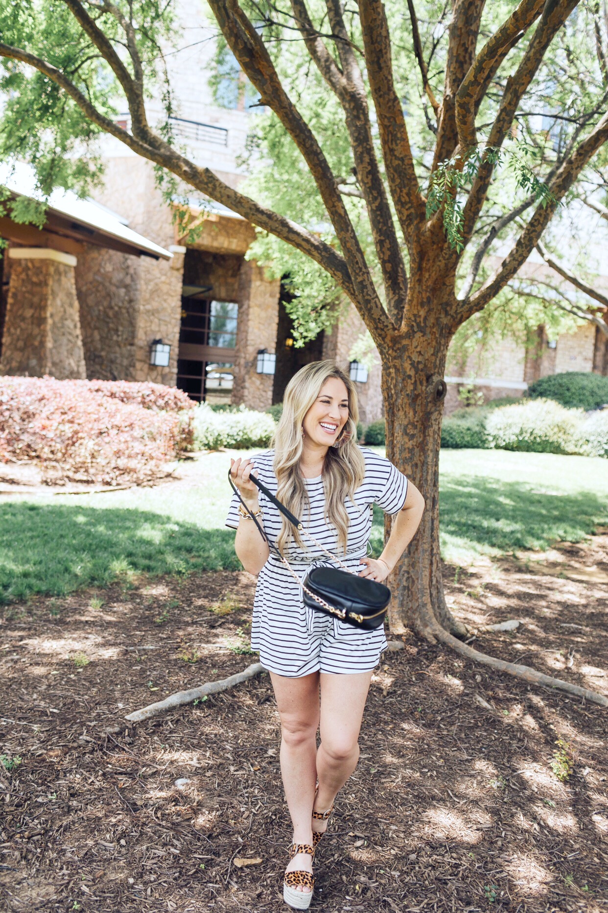 Top 10 Cute Summer Rompers featured by top US fashion blog, Walking in Memphis in High Heels: image of a woman wearing a casual striped summer romper, Marc Fisher leopard espadrille sandals, SUGARFIX hoop earrings