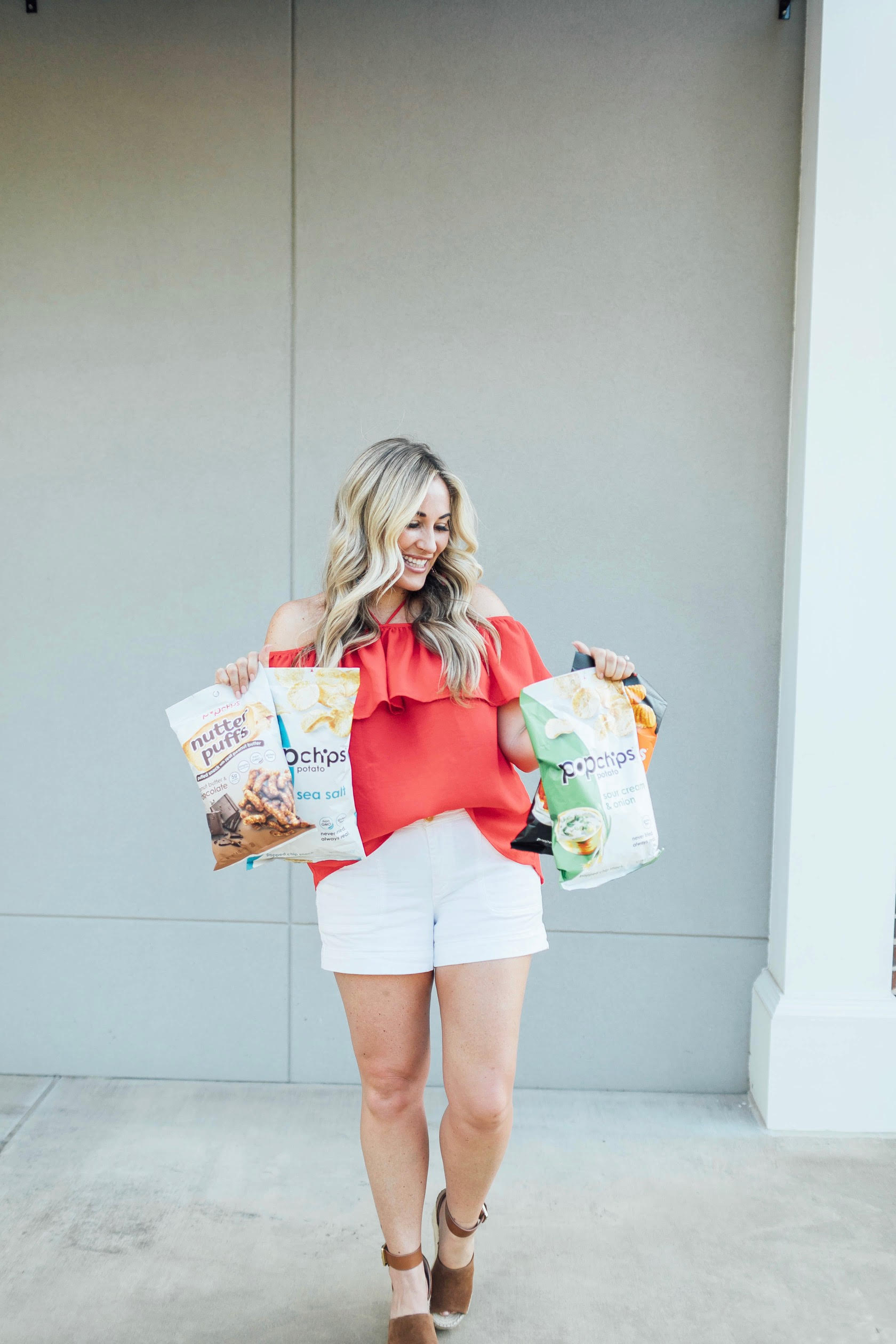 Popchips review: light summer snack featured by top US life and style blog, Walking in Memphis in High Heels: image of a woman a Jack by BB Dakota Off the Shoulder top, Anthropologie belted shorts, BAUBLEBAR raffia statement earrings, and March Fisher ankle strap espadrille sandals