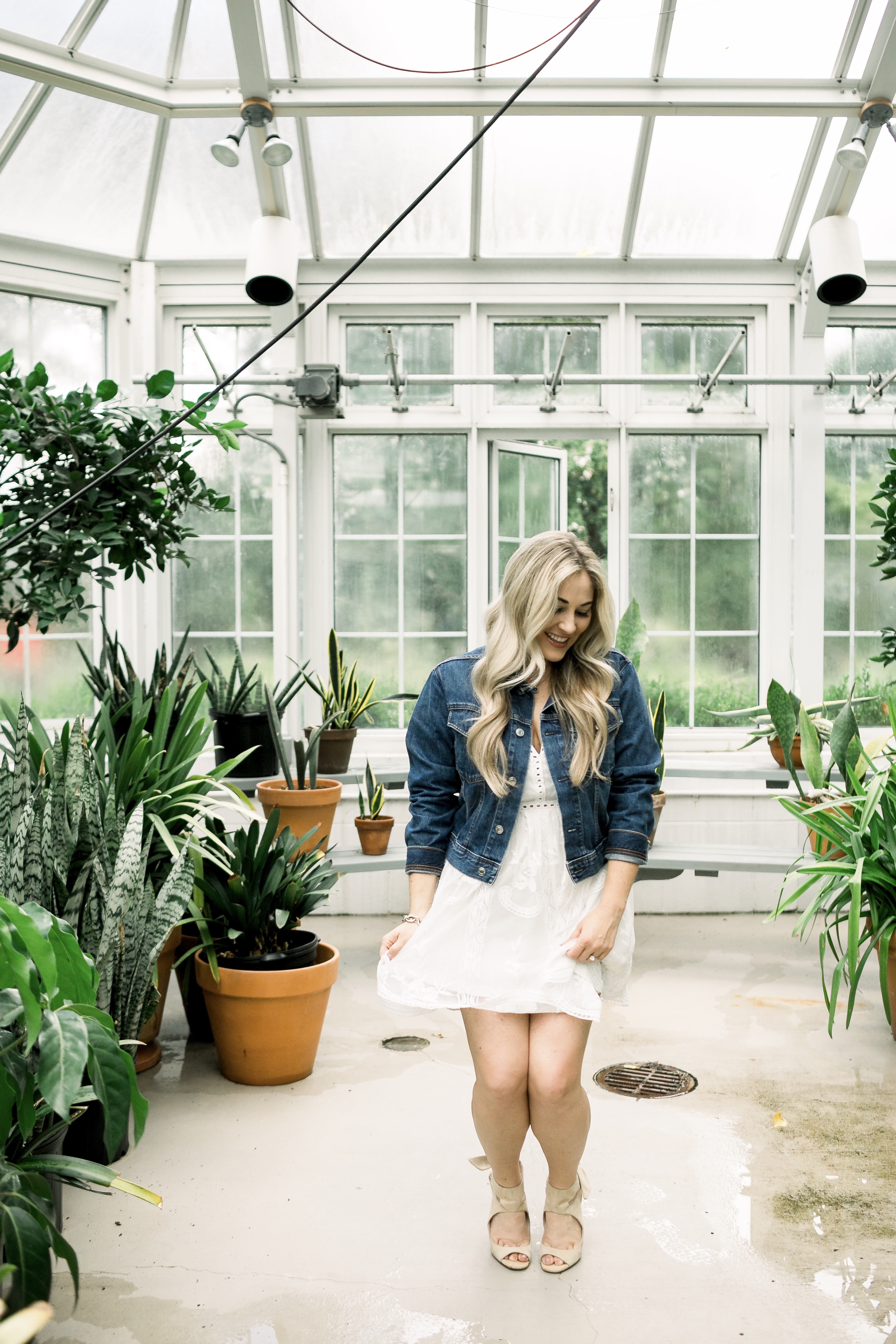 Summer denim look styled by top US fashion blog, Walking in Memphis in High Heels: image of a woman wearing a SheIn embroidered dress and Everyone denim jacket.