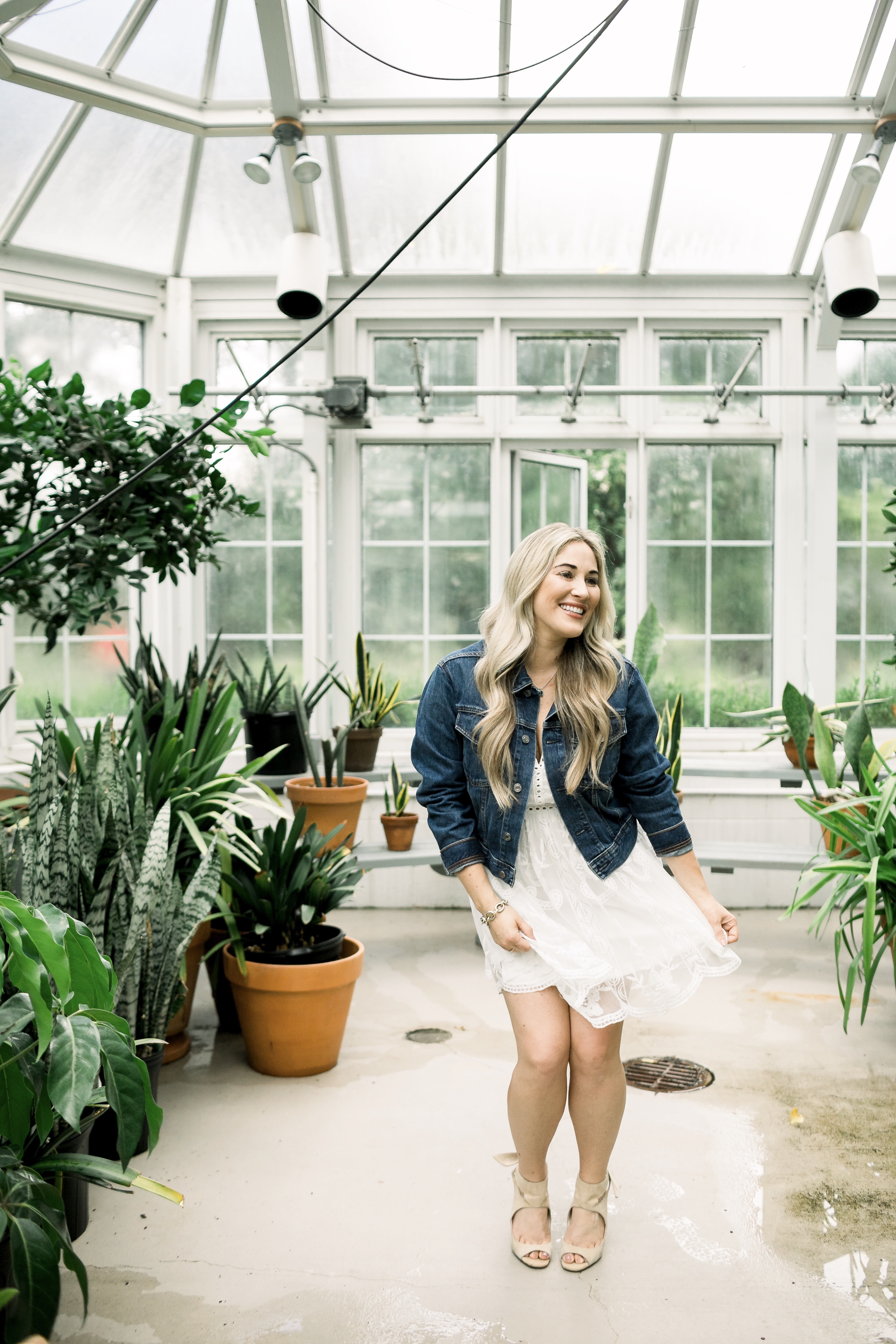 Summer denim look styled by top US fashion blog, Walking in Memphis in High Heels: image of a woman wearing a SheIn embroidered dress and Everyone denim jacket.