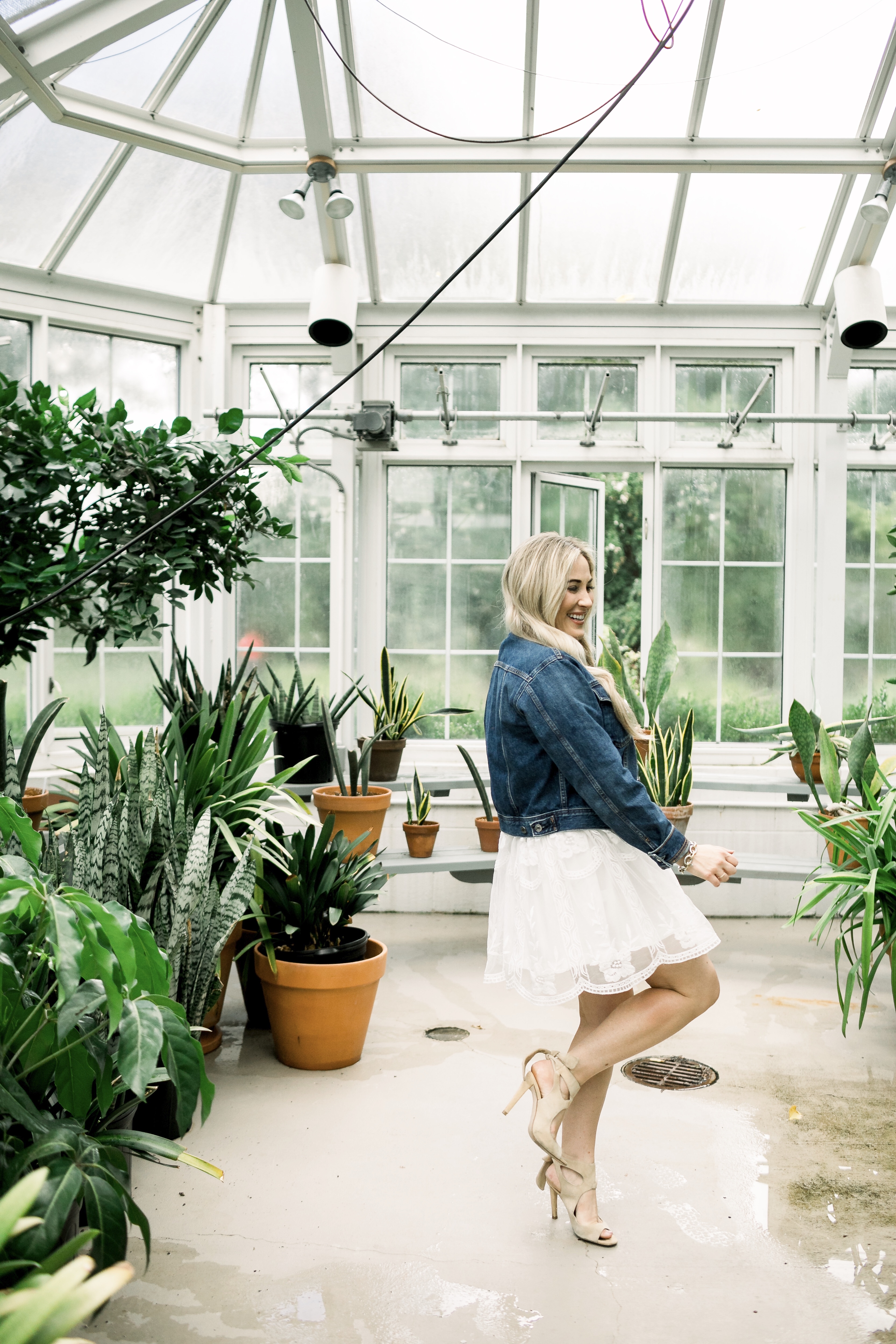 Summer denim look styled by top US fashion blog, Walking in Memphis in High Heels: image of a woman wearing a SheIn embroidered dress and Everyone denim jacket.