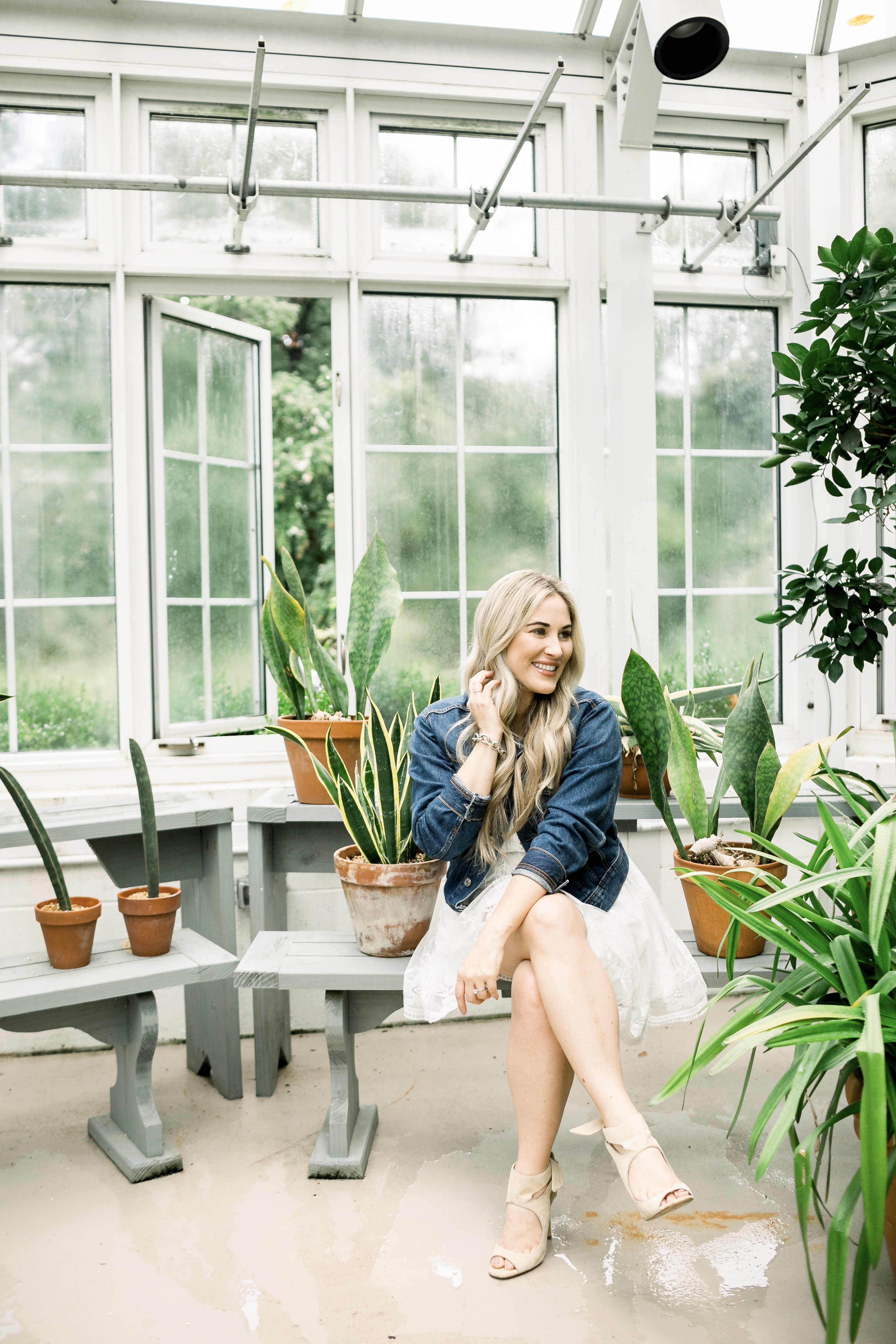 Summer denim look styled by top US fashion blog, Walking in Memphis in High Heels: image of a woman wearing a SheIn embroidered dress and Everyone denim jacket.