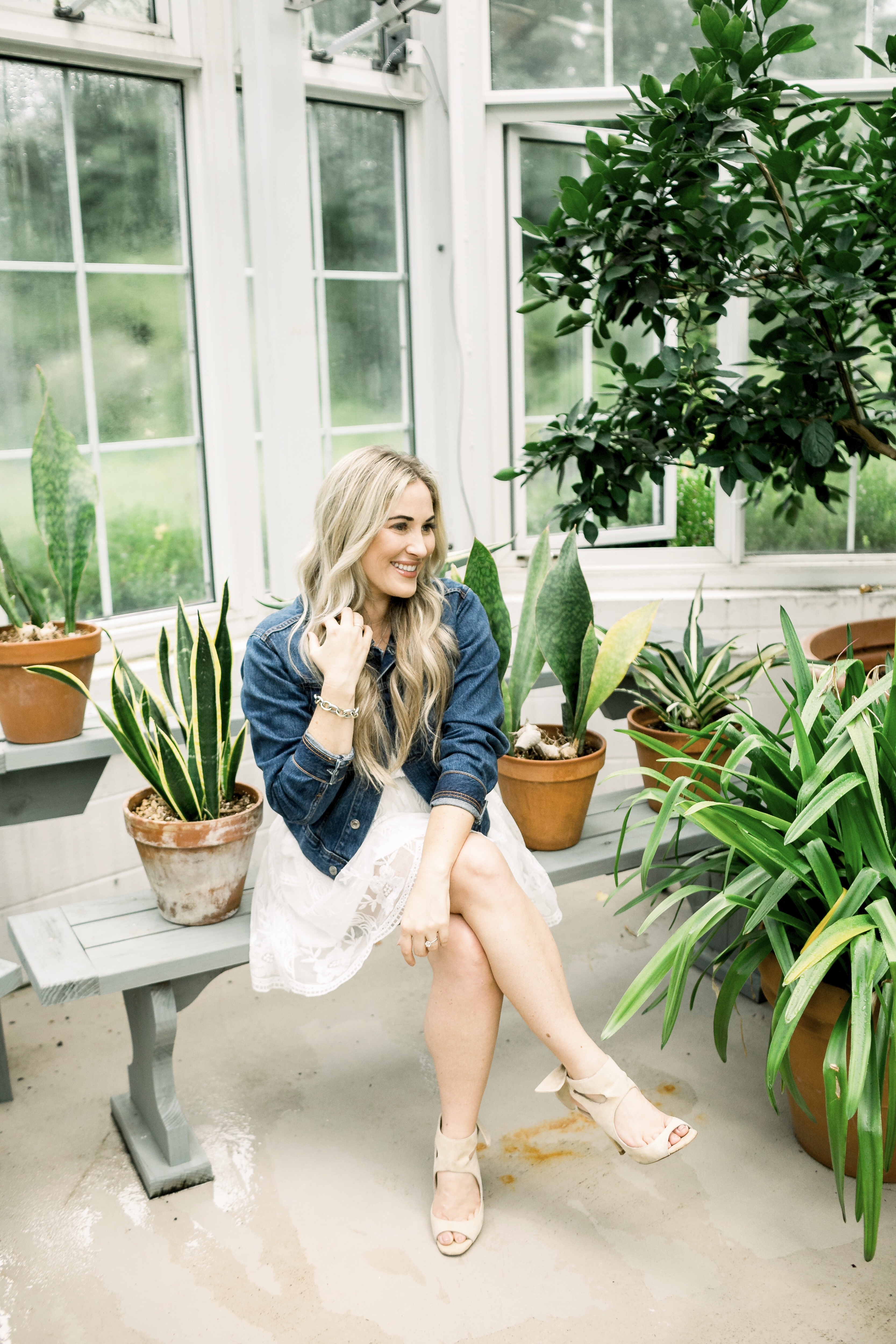 Summer denim look styled by top US fashion blog, Walking in Memphis in High Heels: image of a woman wearing a SheIn embroidered dress and Everyone denim jacket.