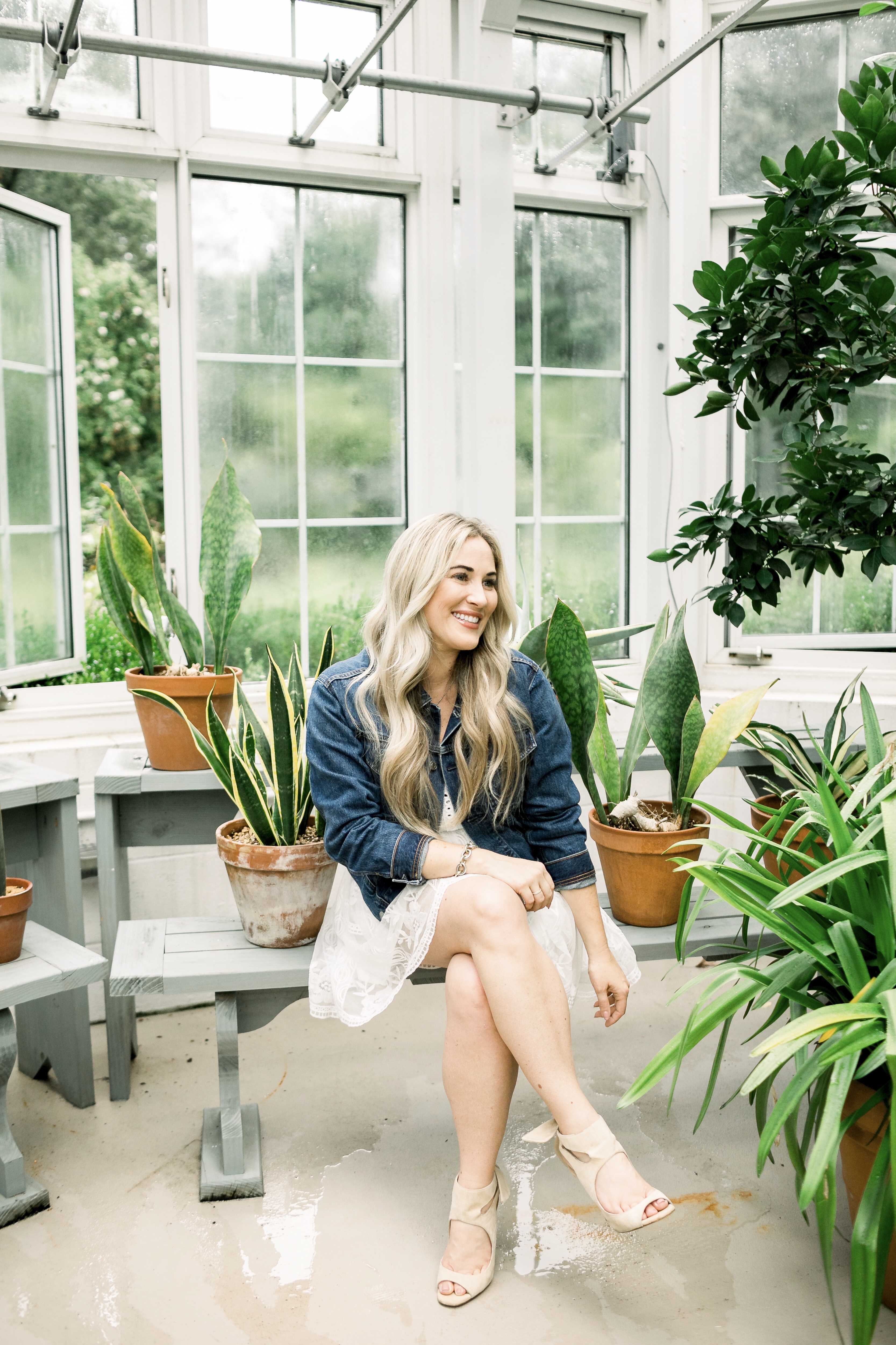 Summer denim look styled by top US fashion blog, Walking in Memphis in High Heels: image of a woman wearing a SheIn embroidered dress and Everyone denim jacket.