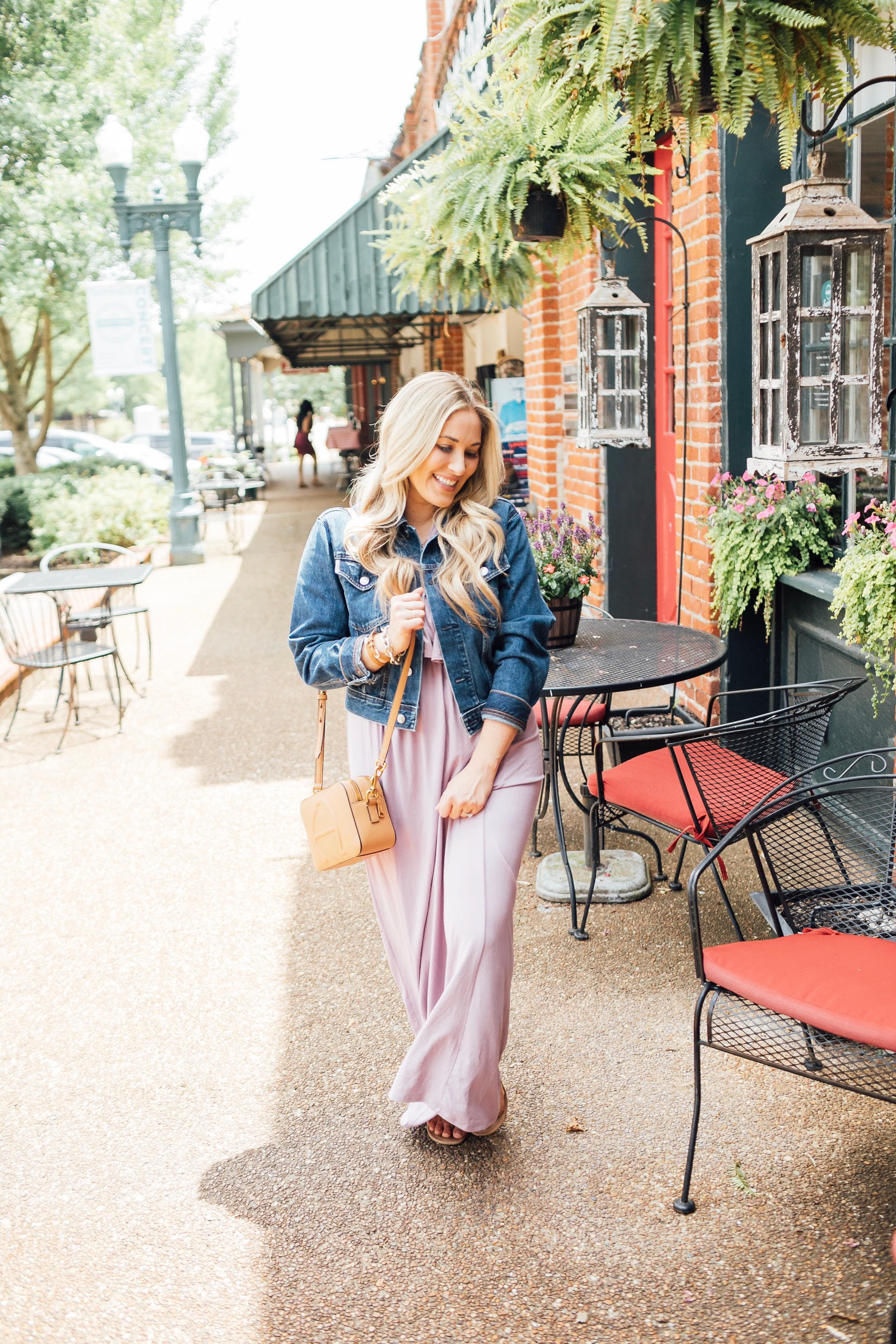 Cute maxi dresses to wear from Summer to Fall featured by top US fashion blog, Walking in Memphis in High Heels: image of a woman wearing a PinkBlush off the shoulder maxi dress, and Tory Burch Miller flip flops.