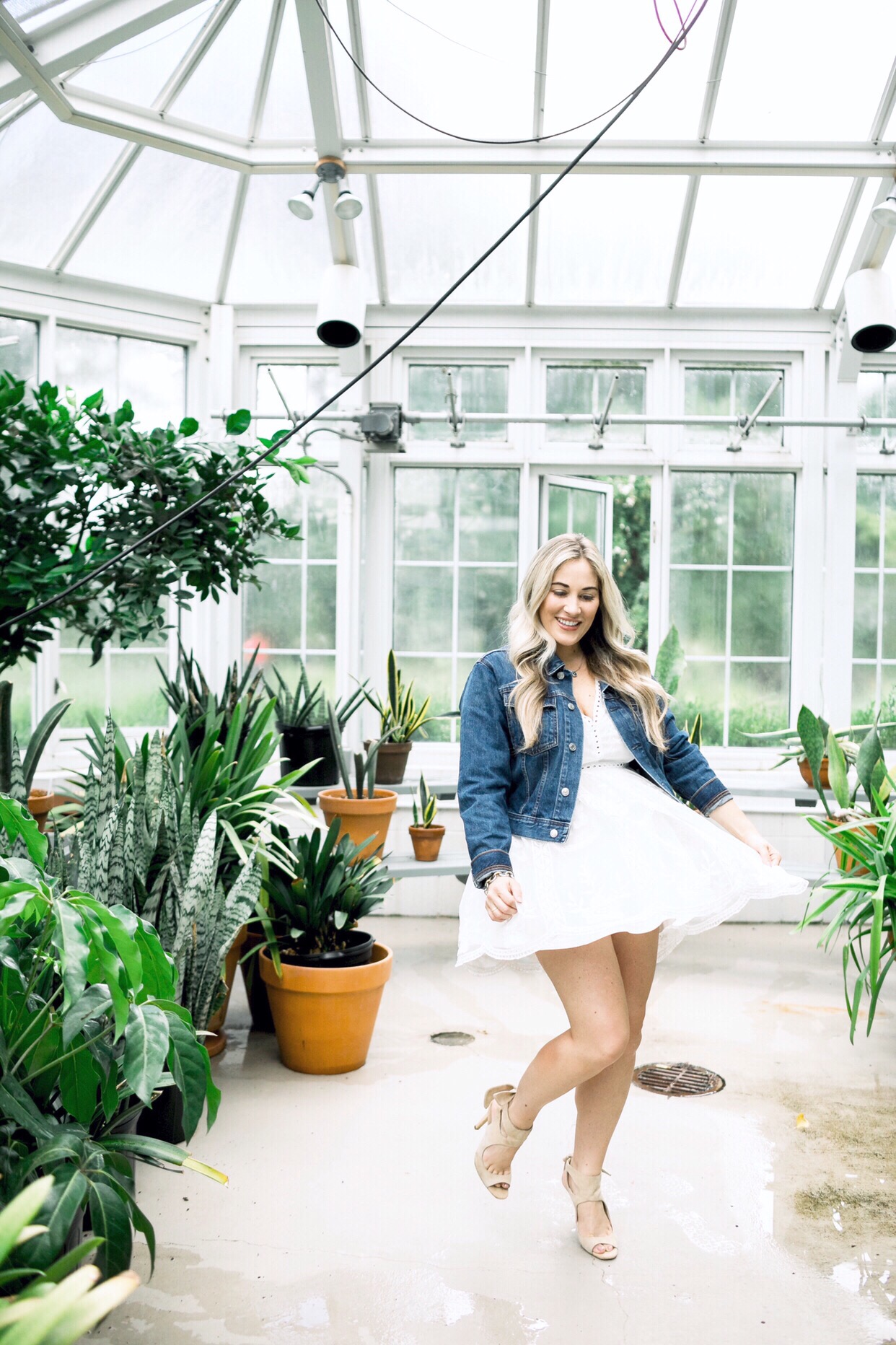 Summer denim look styled by top US fashion blog, Walking in Memphis in High Heels: image of a woman wearing a SheIn embroidered dress and Everyone denim jacket.