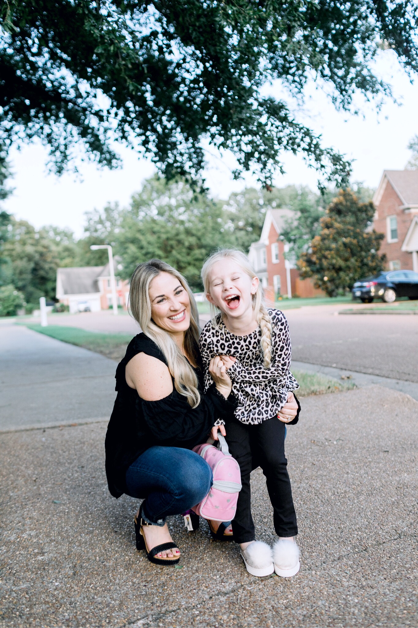 Walmart back to school style featured by top US fashion blog, Walking in Memphis in High Heels: image of a woman wearing Sofia Jeans by Sofia Vergara high waisted jeans, and a Love Sadie black blouse, and a little girl wearing a Garanimals 2 piece set, and The Children’s Place pom slip ons.