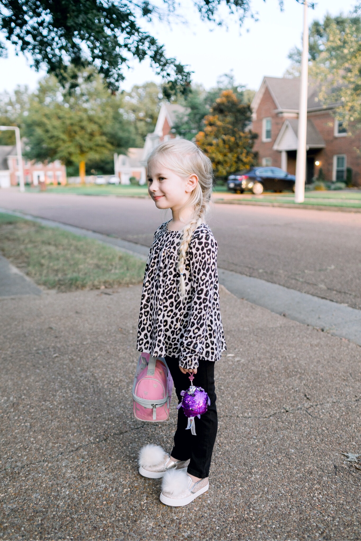 Walmart back to school style featured by top US fashion blog, Walking in Memphis in High Heels: image of a woman wearing Sofia Jeans by Sofia Vergara high waisted jeans, and a Love Sadie black blouse, and a little girl wearing a Garanimals 2 piece set, and The Children’s Place pom slip ons.
