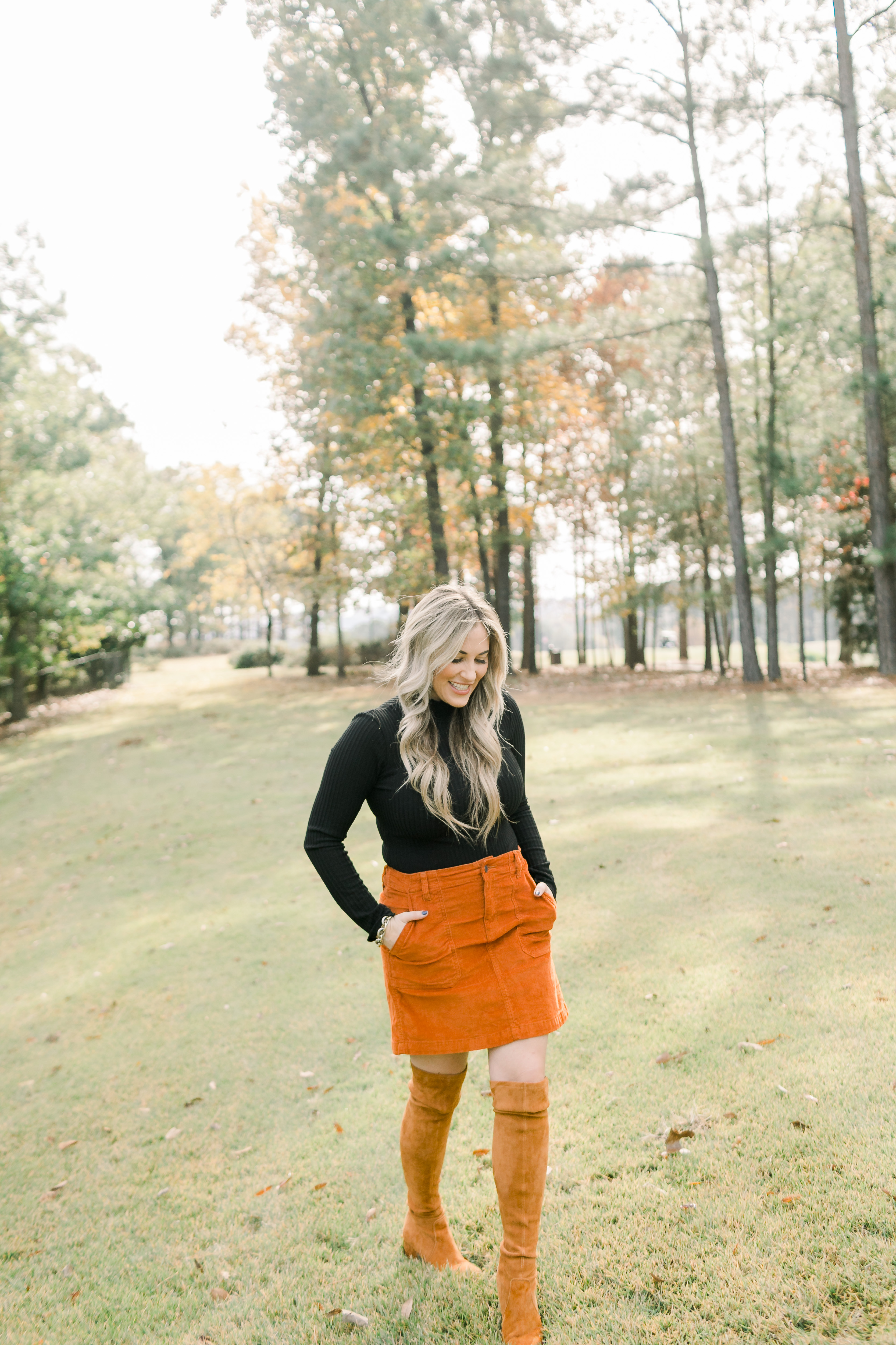 Fall Footwear featured by top US fashion blog, Walking in Memphis in High Heels: image of a woman wearing Goodnight Macaron knee high suede leather boots.