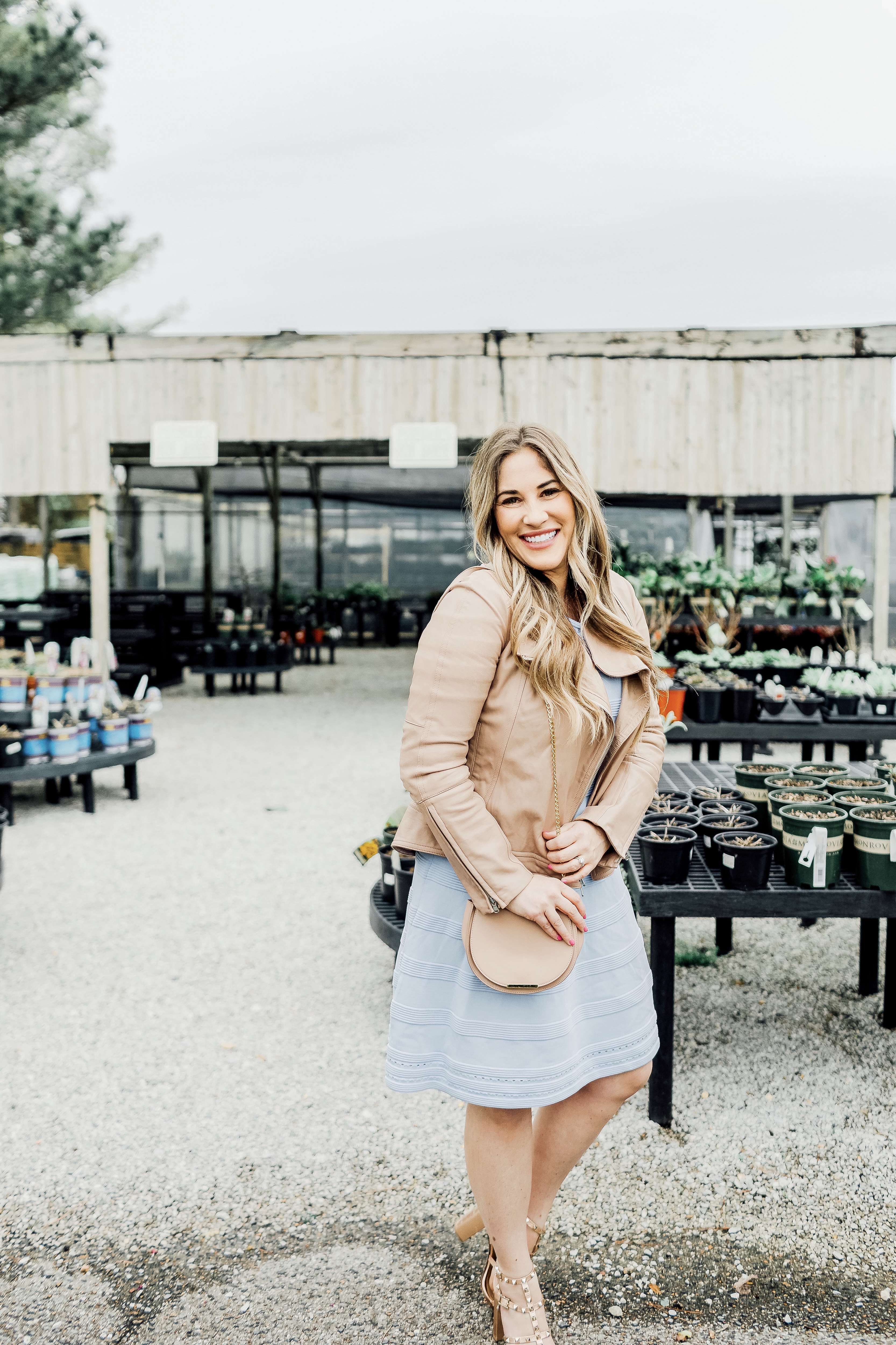 Cute Easter Dresses featured by top Memphis fashion blog, Walking in Memphis in High Heels: image of a woman wearing a pastel blue Eliza J sweater dress.