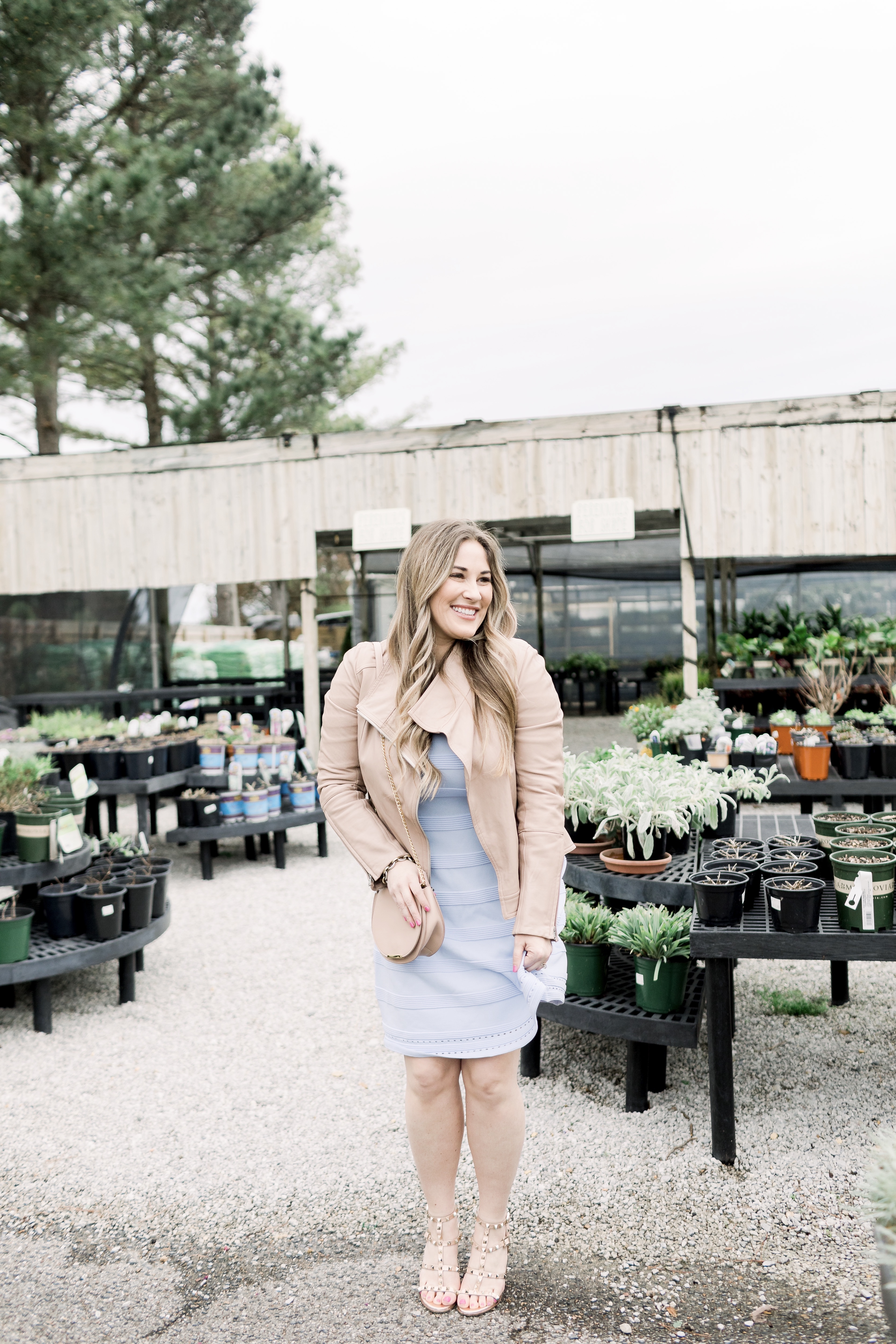 Cute Easter Dresses featured by top Memphis fashion blog, Walking in Memphis in High Heels: image of a woman wearing a pastel blue Eliza J sweater dress.