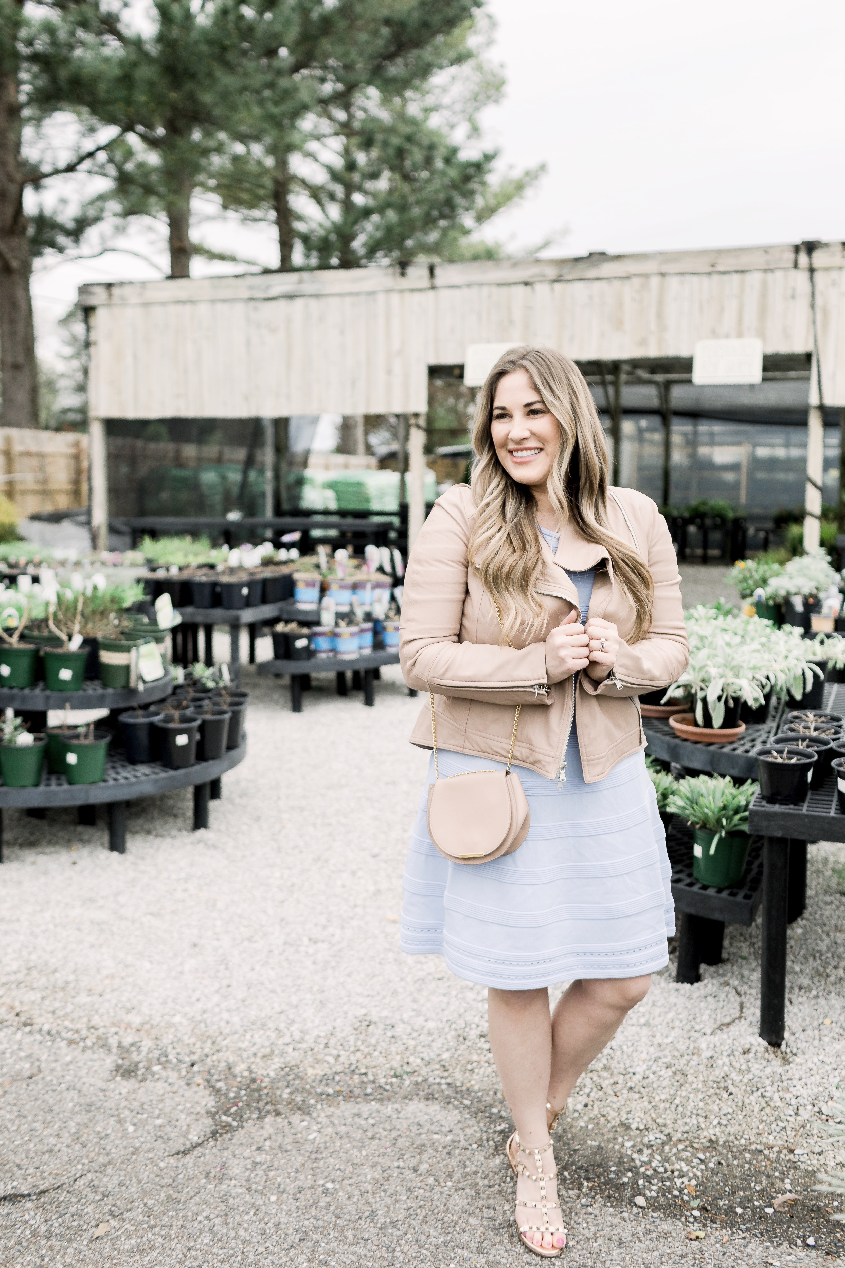 Cute Easter Dresses featured by top Memphis fashion blog, Walking in Memphis in High Heels: image of a woman wearing a pastel blue Eliza J sweater dress.