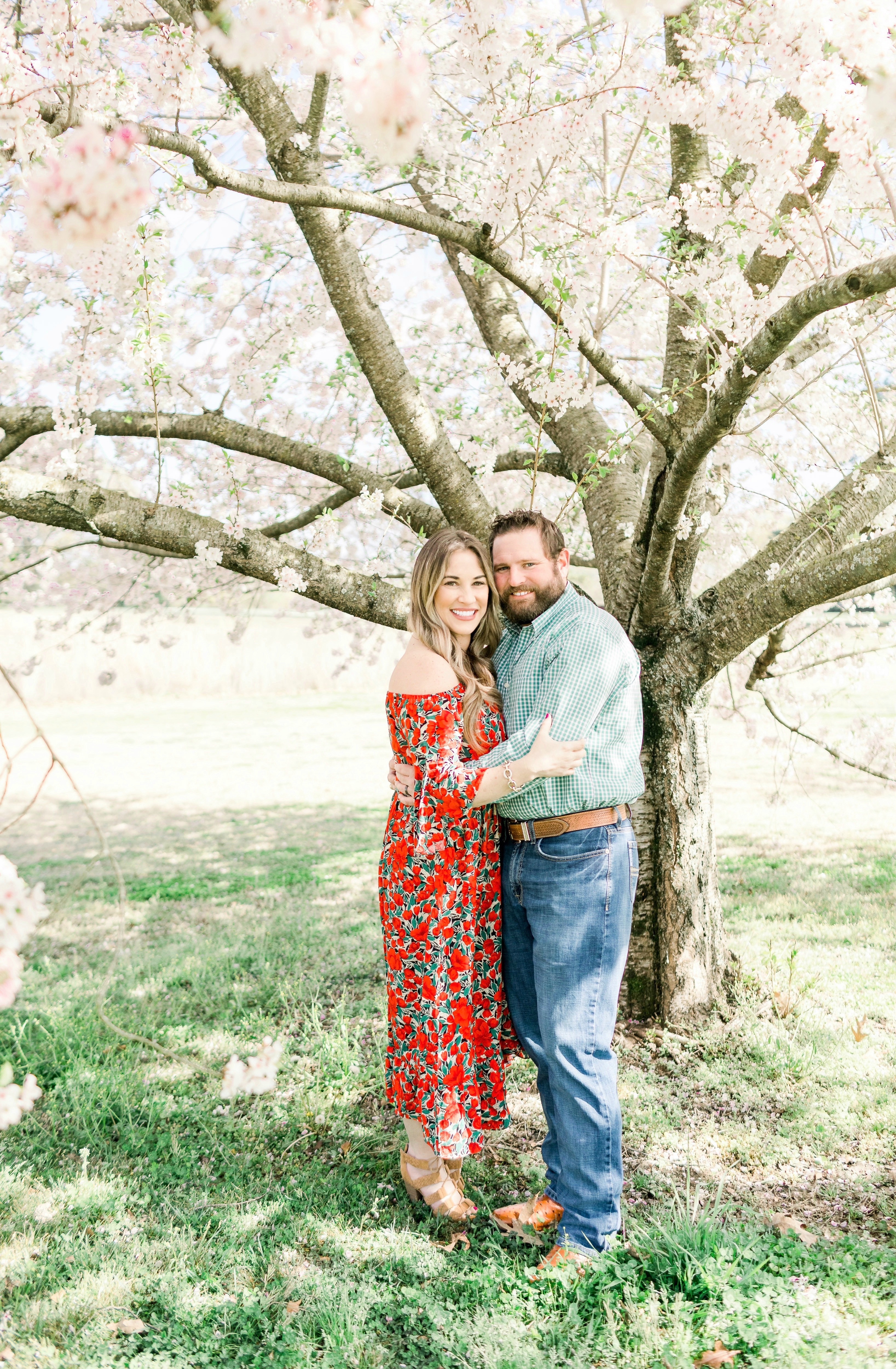 Spring florals styled by top Memphis life and style blog, Walking in Memphis in High Heels: image of a woman wearing a Pink Blush off the shoulder maxi floral dress.