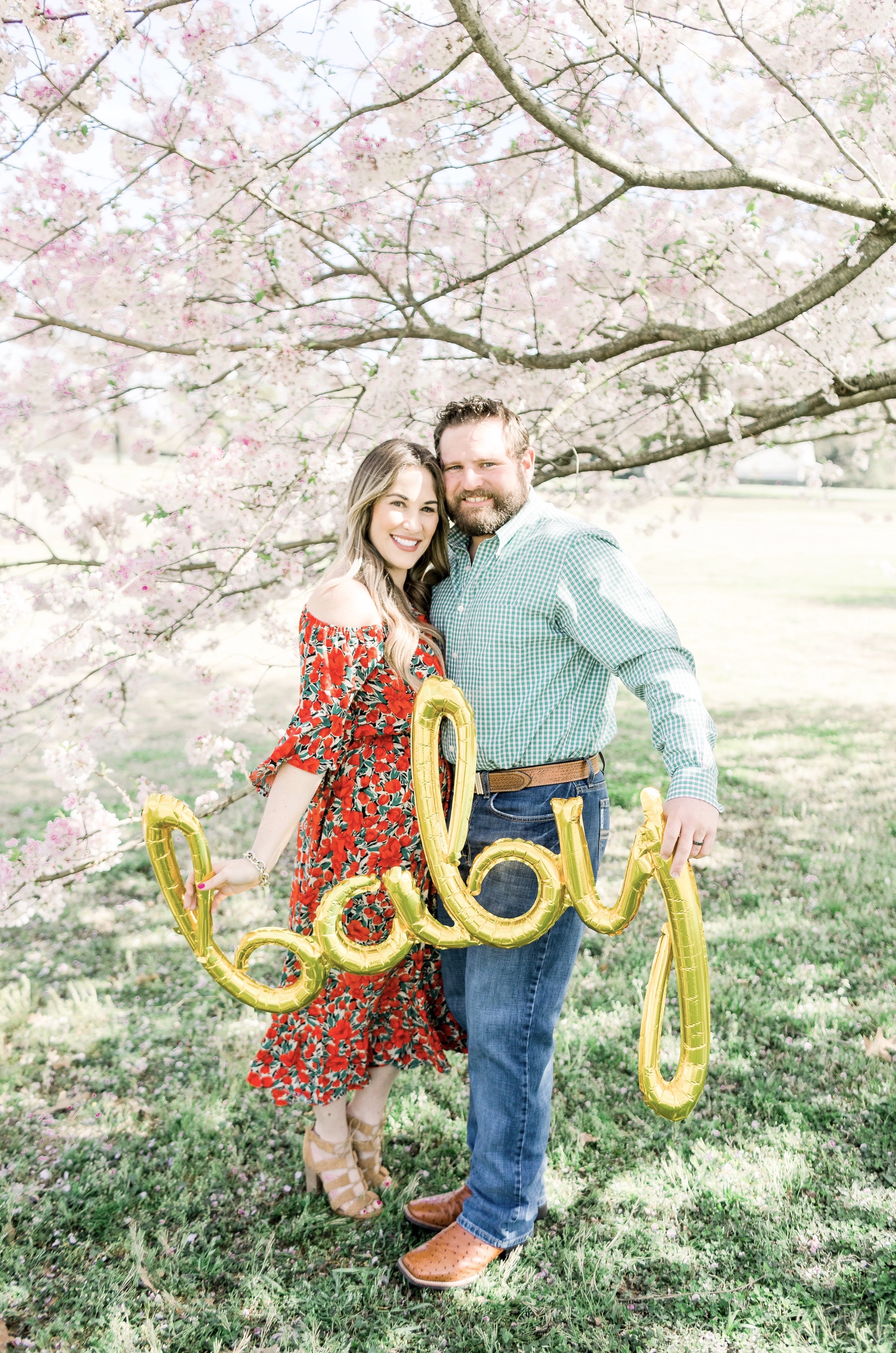 Spring florals styled by top Memphis life and style blog, Walking in Memphis in High Heels: image of a woman wearing a Pink Blush off the shoulder maxi floral dress.