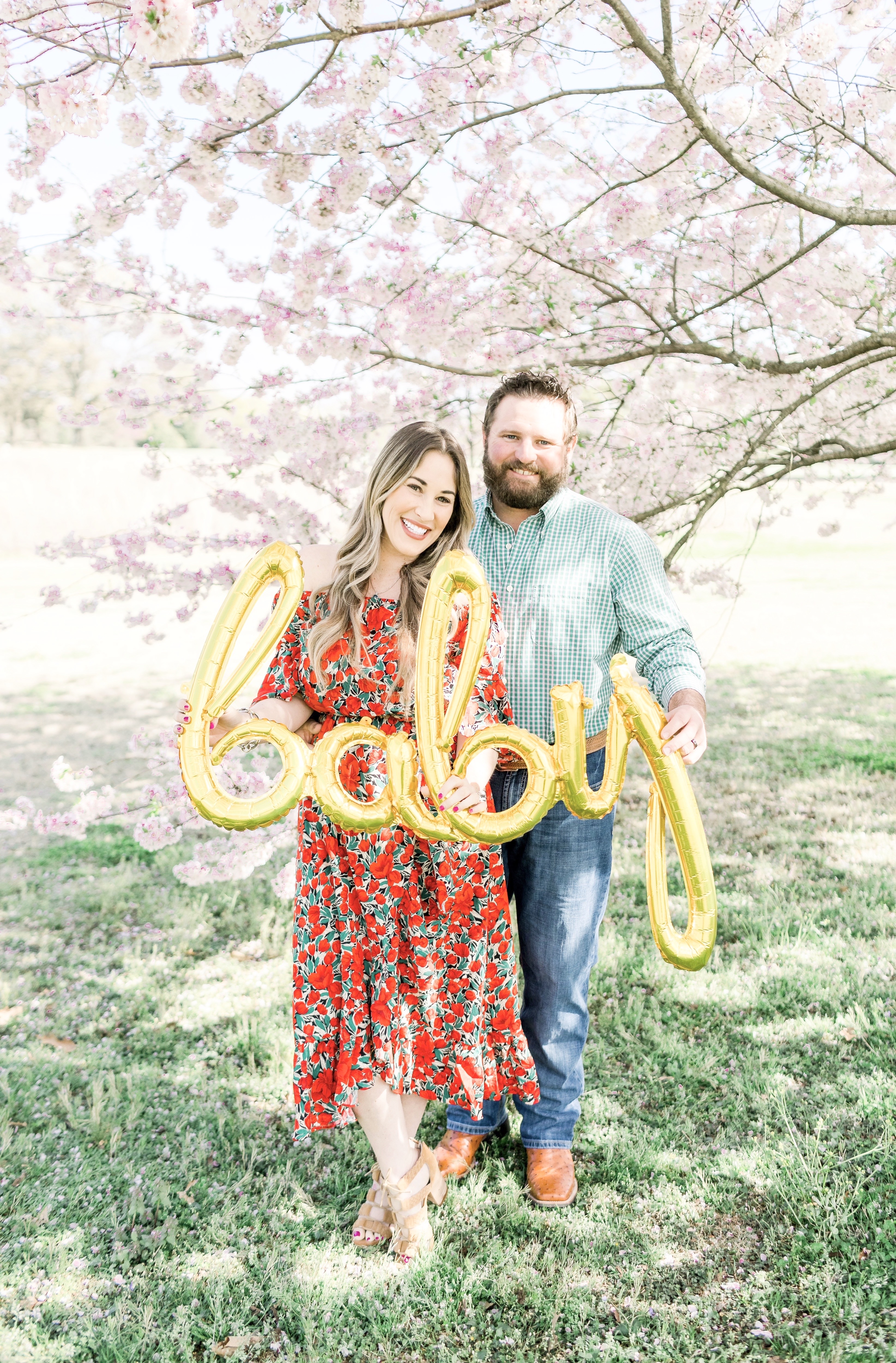 Spring florals styled by top Memphis life and style blog, Walking in Memphis in High Heels: image of a woman wearing a Pink Blush off the shoulder maxi floral dress.