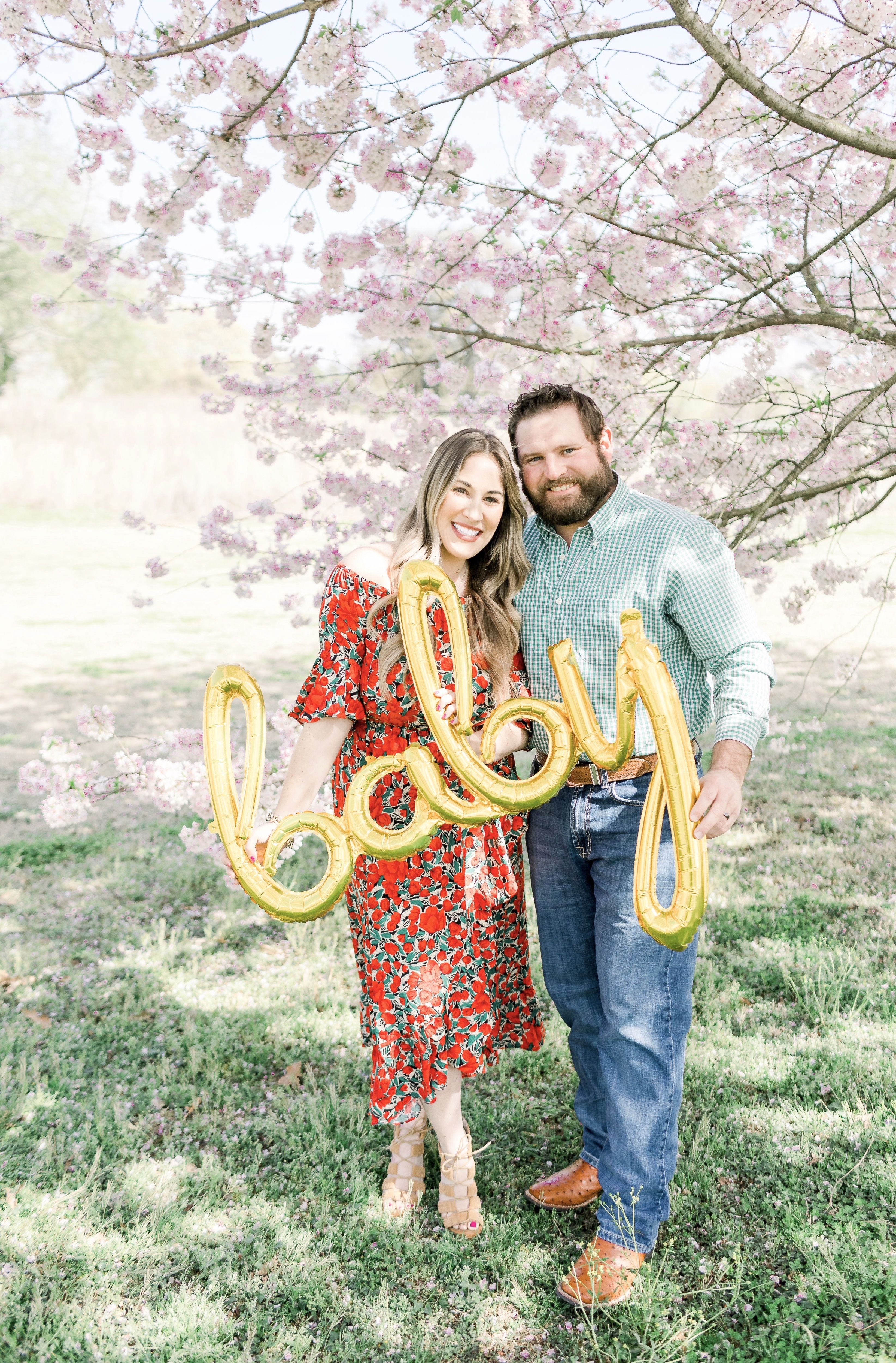 Spring florals styled by top Memphis life and style blog, Walking in Memphis in High Heels: image of a woman wearing a Pink Blush off the shoulder maxi floral dress.