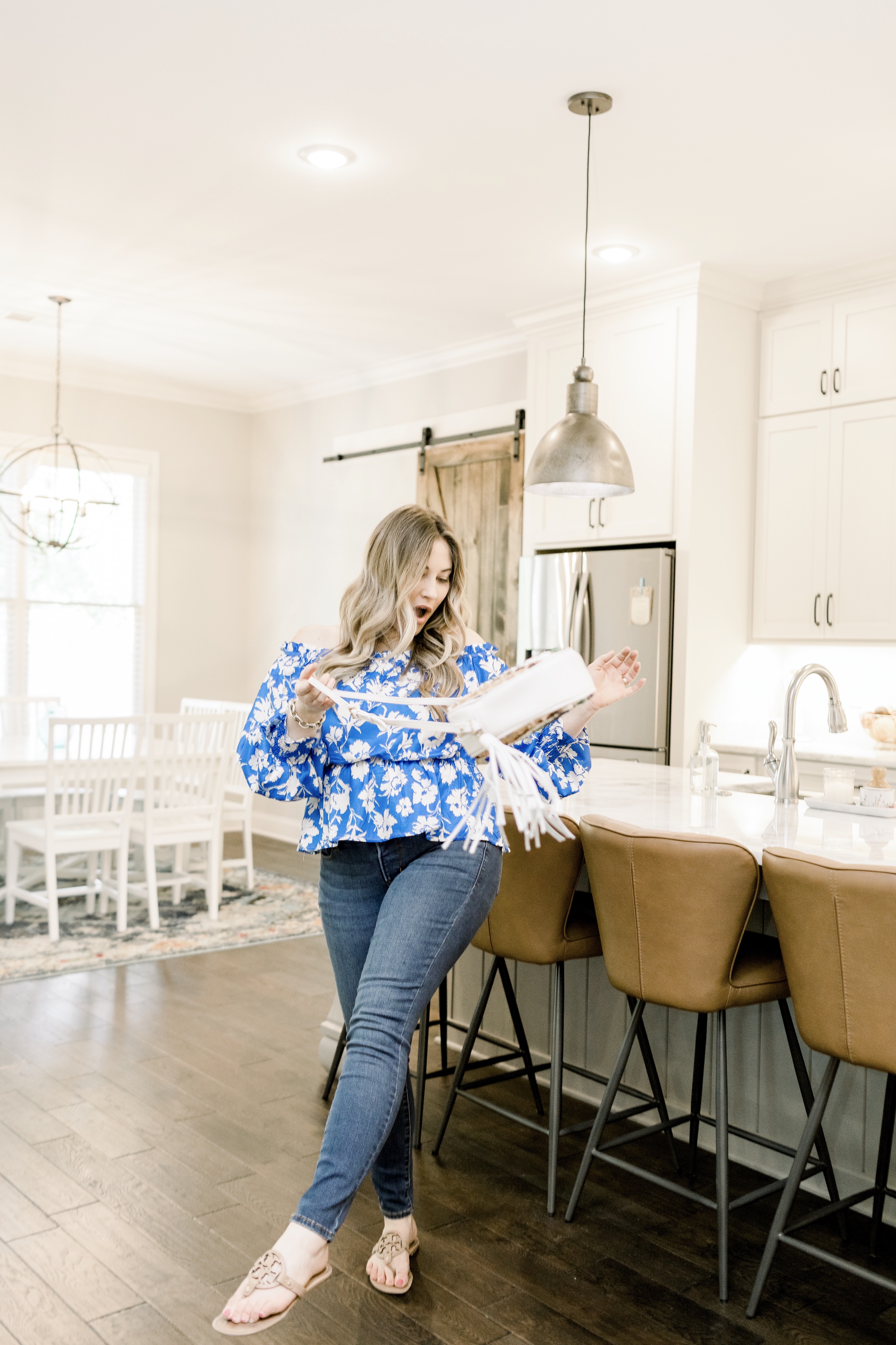 Spring denim styled by top Memphis fashion blog, Walking in Memphis in High Heels: image of a woman wearing LOFT curvy high waist jeans.