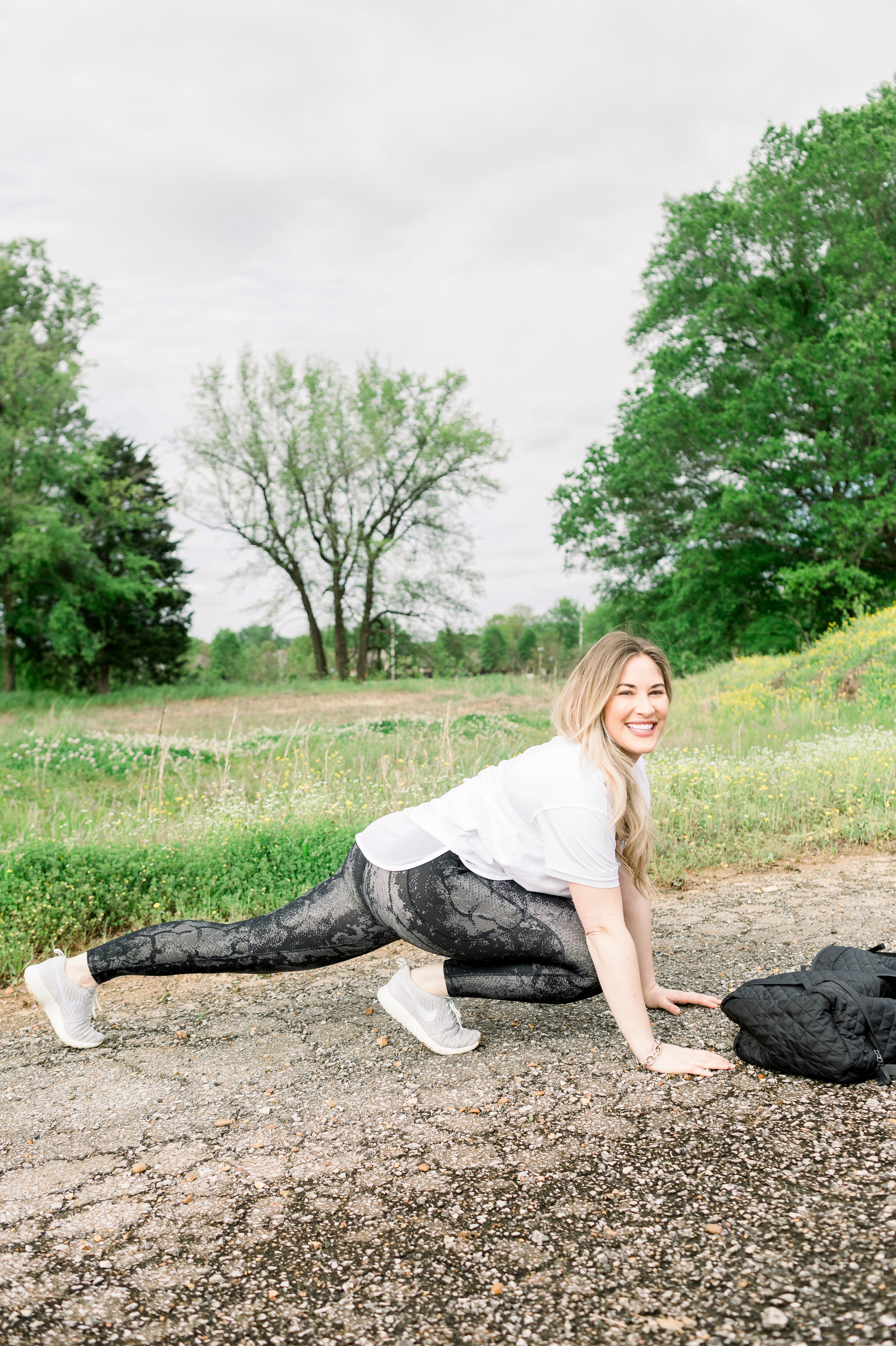 Spring athleisure  favorites featured by top Memphis fitness blog, Walking in Memphis in High Heels: image of a woman wearing Calia by Carrie Underwood leggings, Calia by Carrie Underwood t-shirt, and Nike Roshe One.