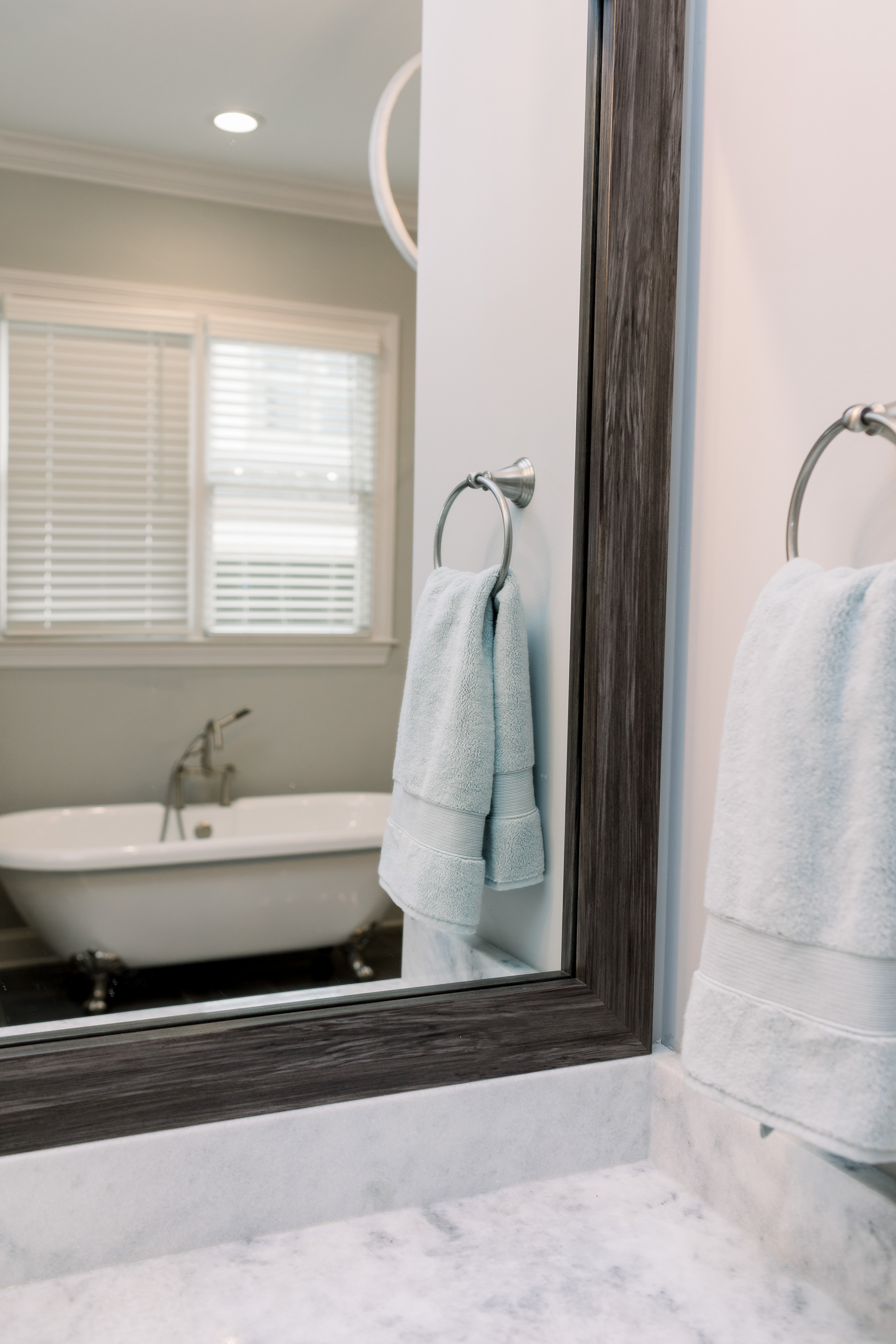 How to Update Bathroom Mirrors on a Budget, tips featured by top Memphis lifestyle blogger, Walking in Memphis in High Heels.