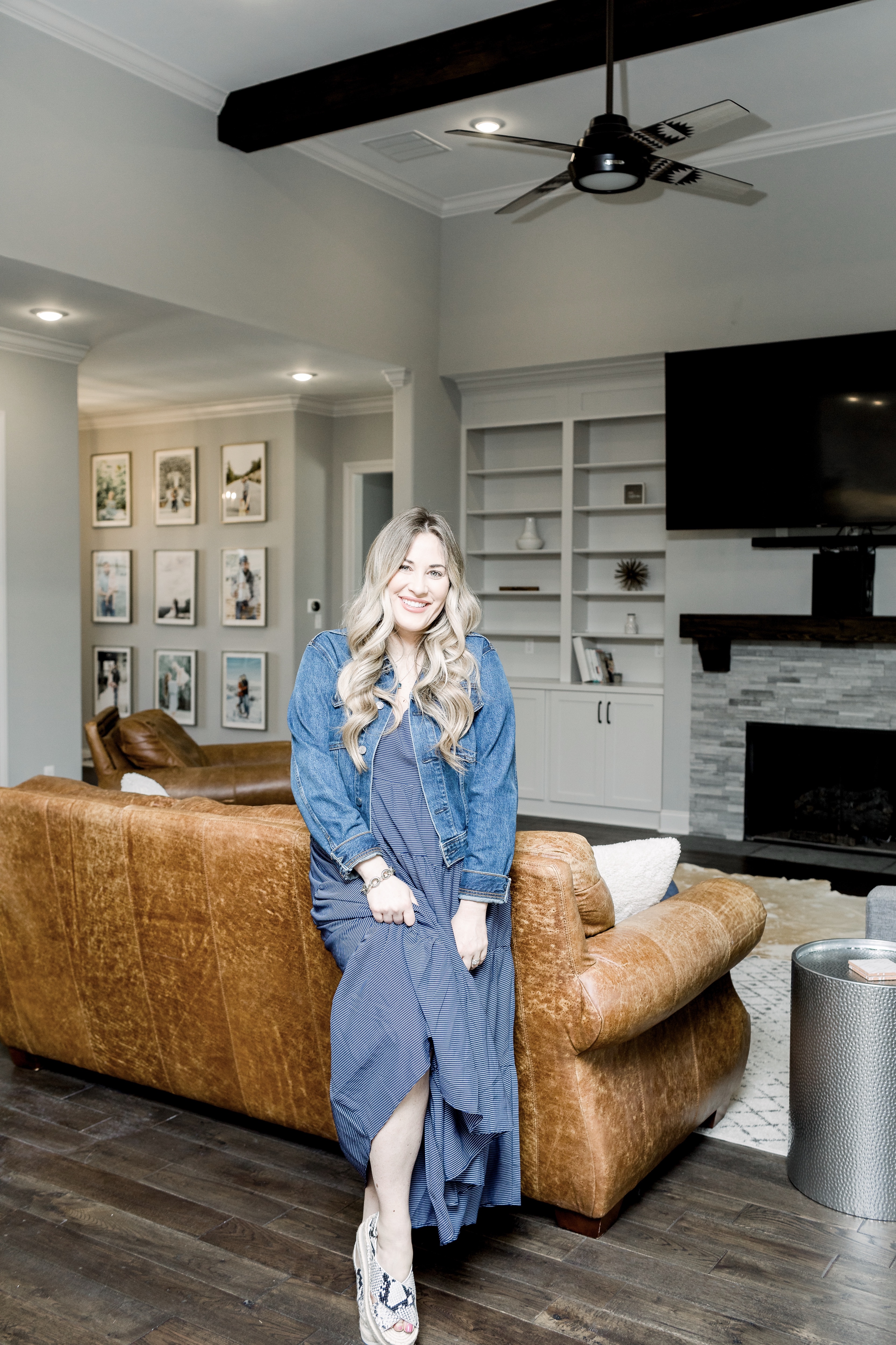 Mother's Day outfits featured by top Memphis fashion blog, Walking in Memphis in High Heels: image of a woman wearing Loyal Hana maternity dress, Everlane denim jacket and Marc Fisher espadrille sandals.