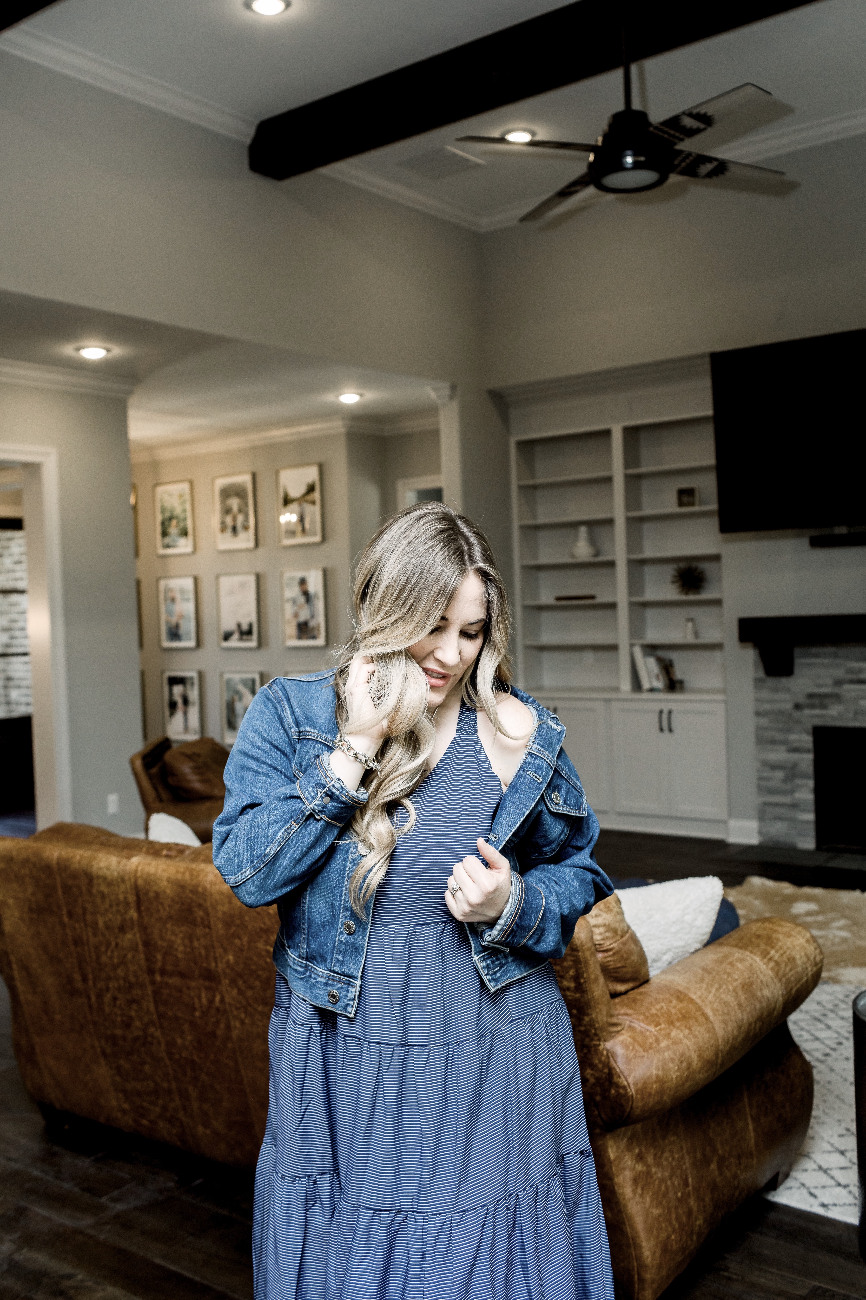 Mother's Day outfits featured by top Memphis fashion blog, Walking in Memphis in High Heels: image of a woman wearing Loyal Hana maternity dress, Everlane denim jacket and  Marc Fisher espadrille sandals.