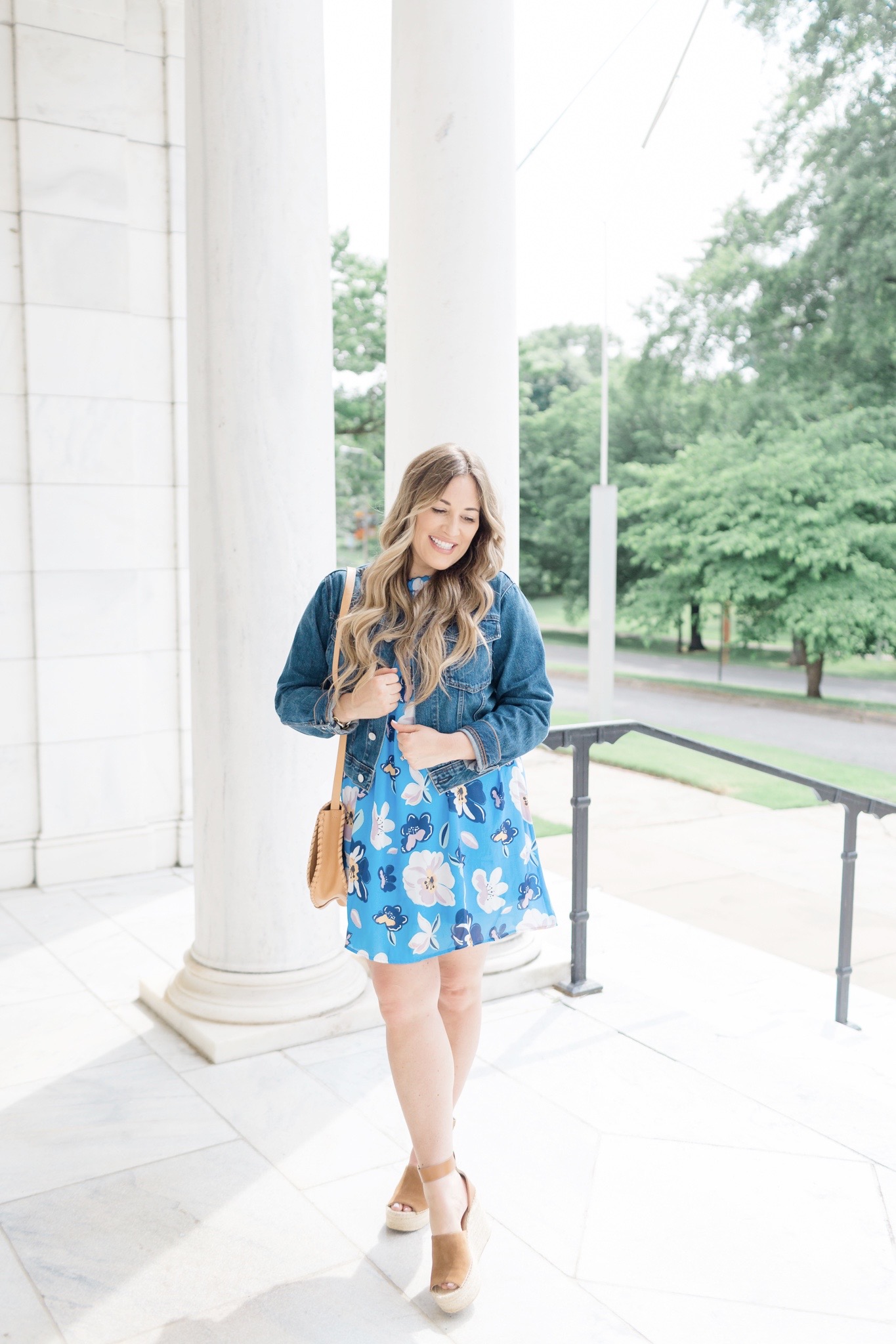 Summer colors featured by top Memphis fashion blogger, Walking in Memphis in High Heels: image of a woman wearing a Pink Lily blue floral dress.